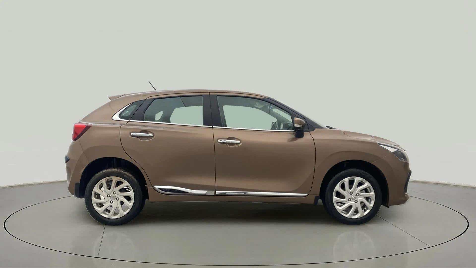 Side view of a Maruti Suzuki Baleno