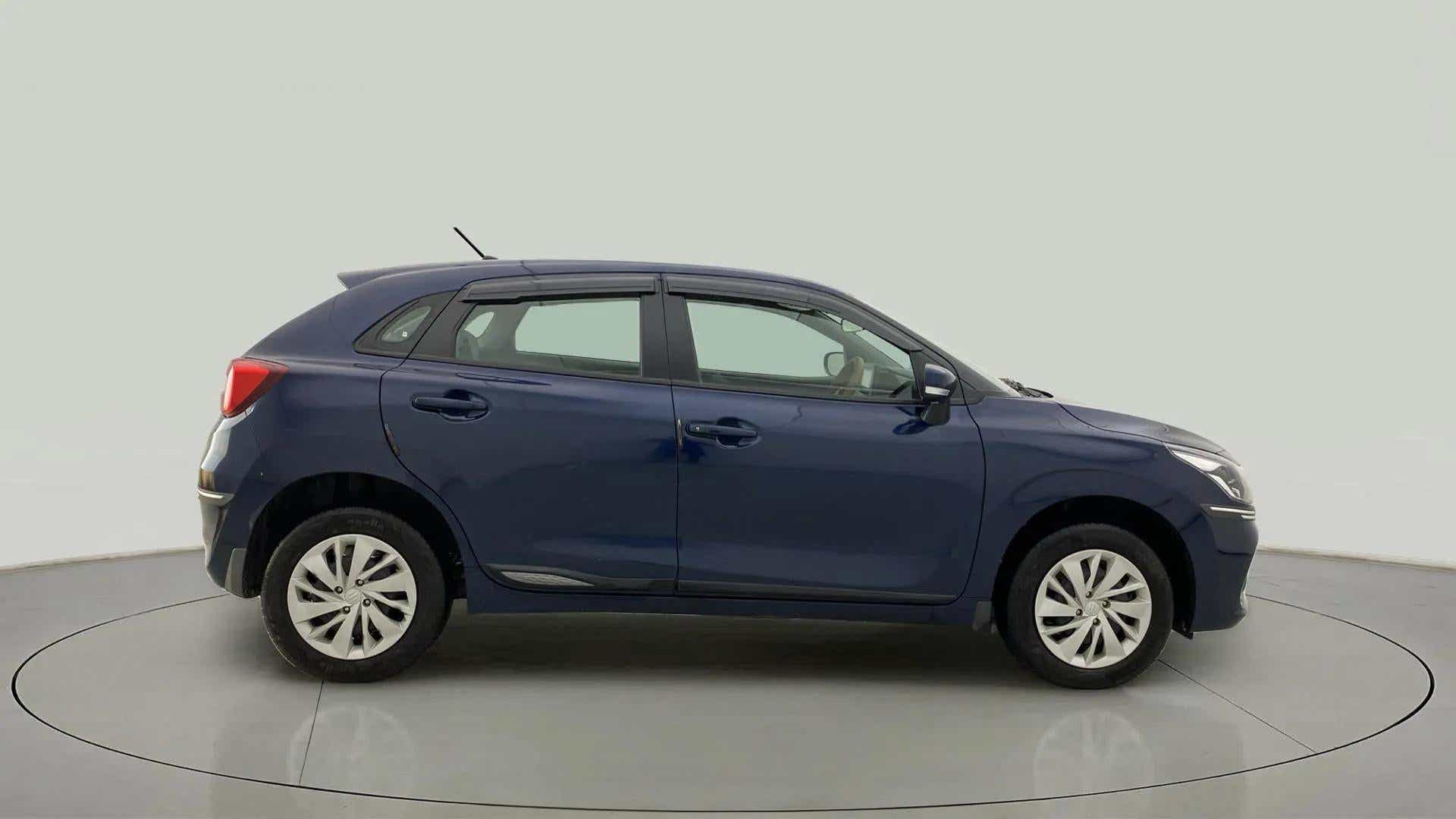 Side view of a Nexa Blue Maruti Suzuki Baleno