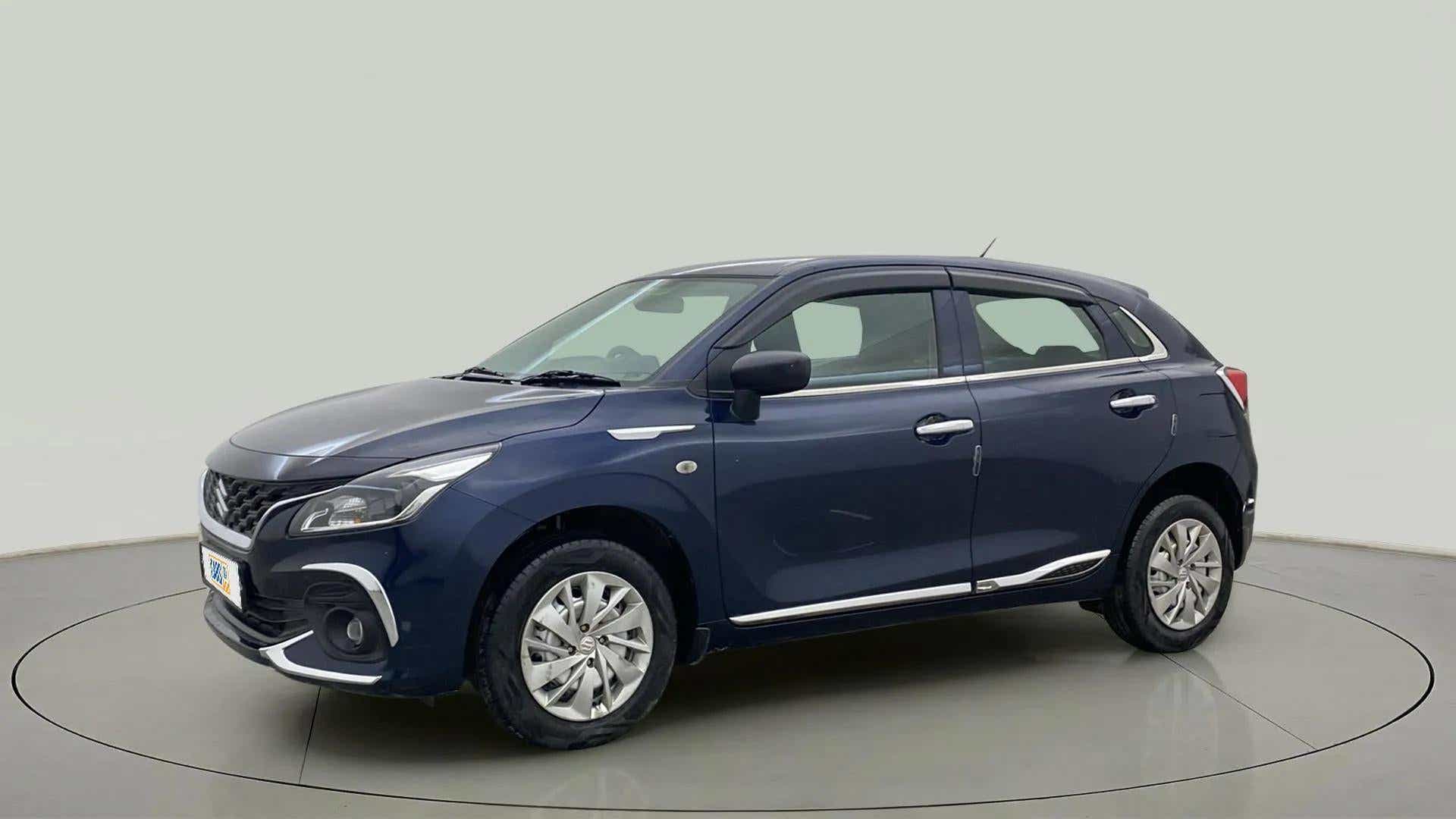 Front three-quarter view of a Nexa Blue Maruti Suzuki Baleno