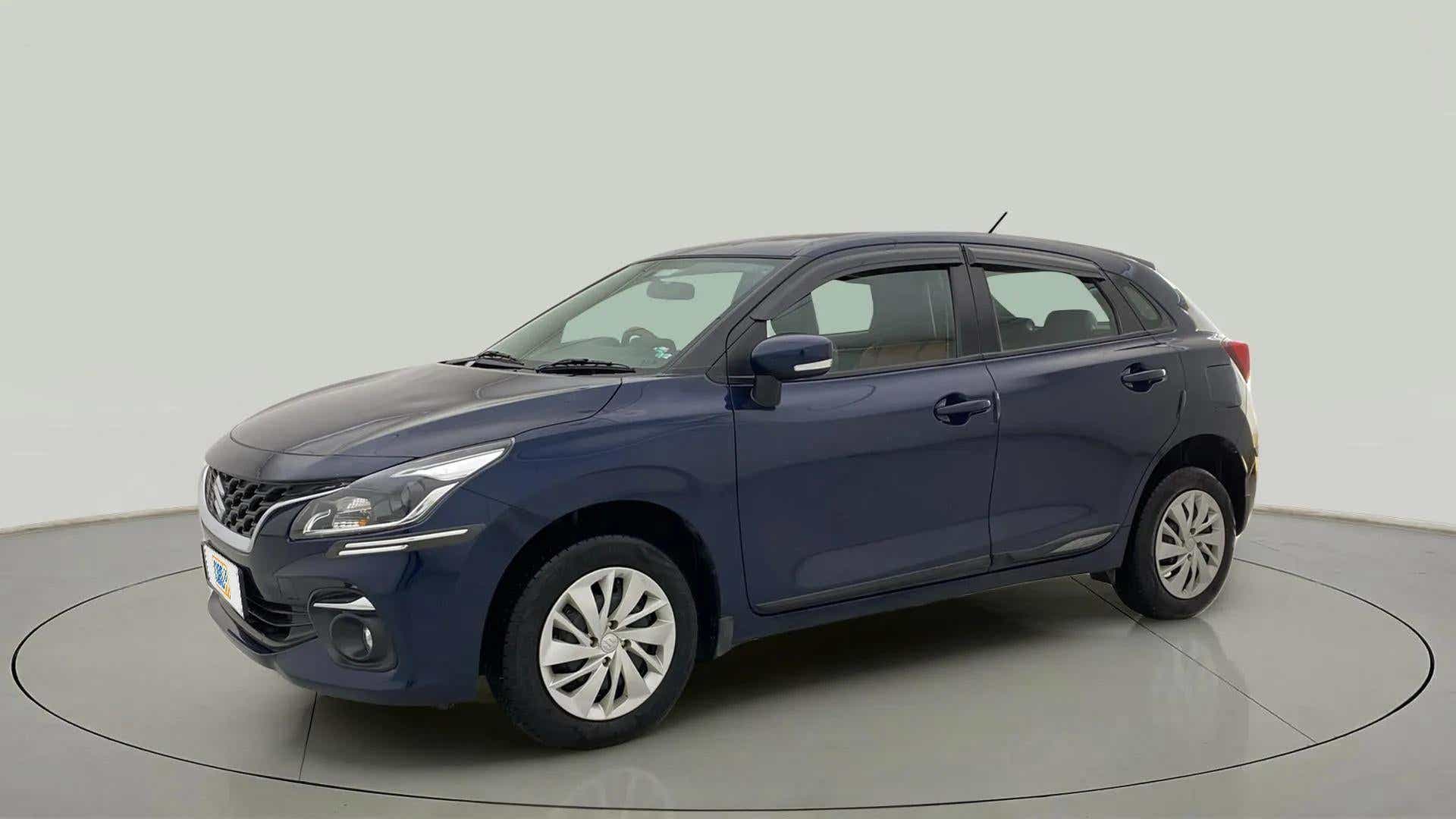 Front three-quarter view of a Nexa Blue Maruti Suzuki Baleno