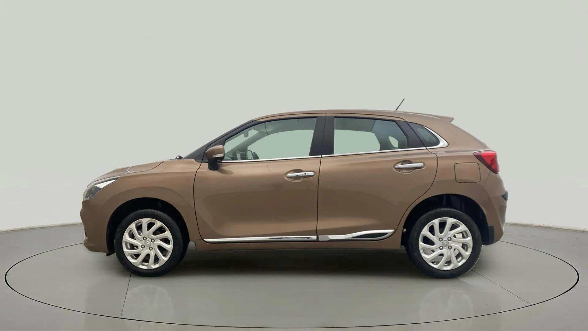 Side view of a Maruti Suzuki Baleno
