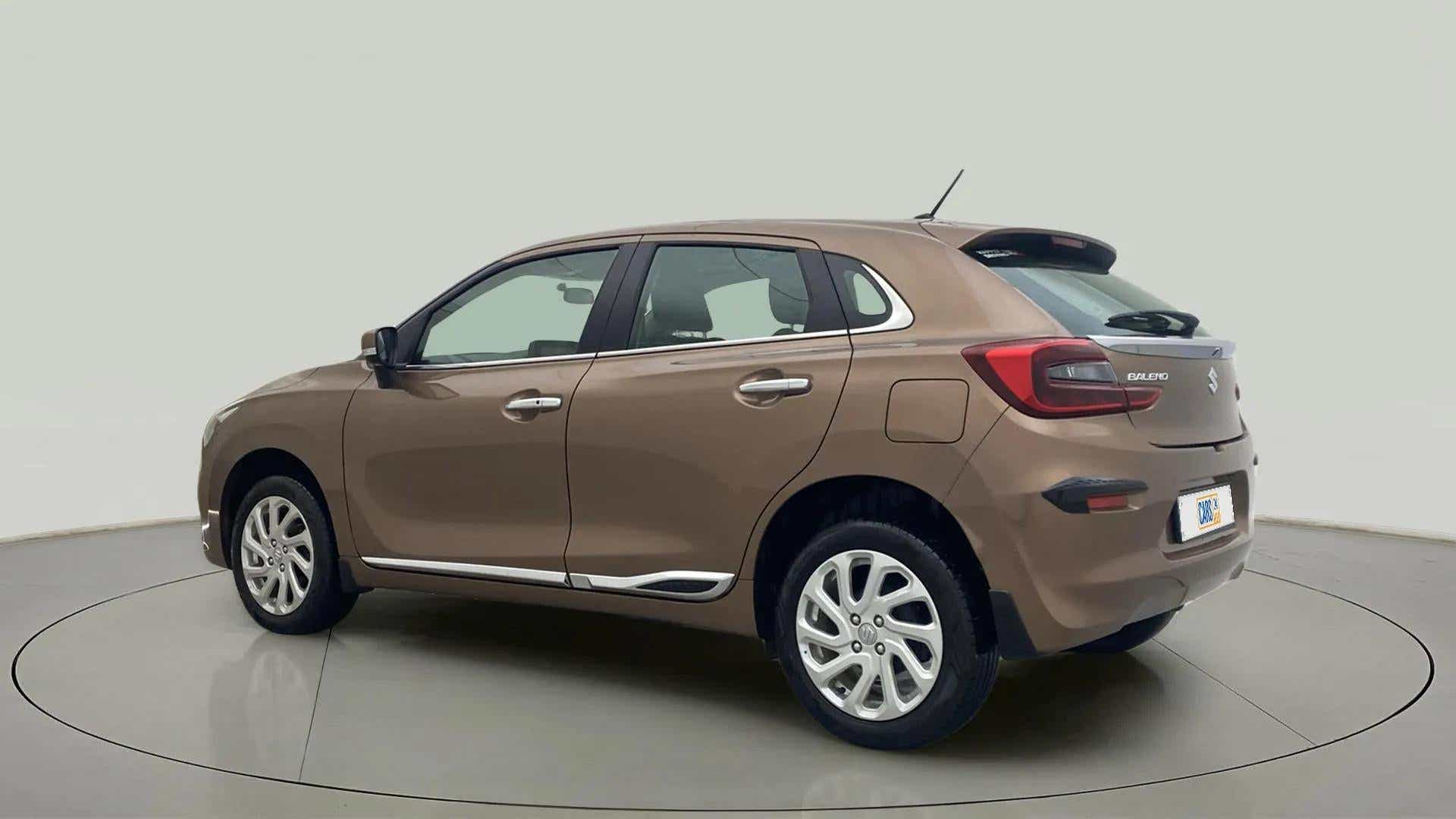 Rear three-quarter of a Maruti Suzuki Baleno