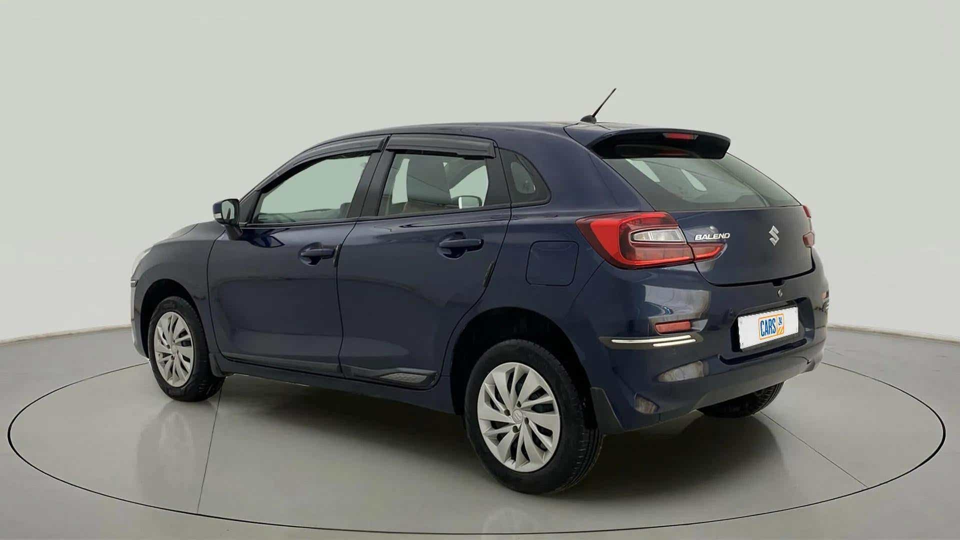 Rear three-quarter view of a Nexa Blue Maruti Suzuki Baleno