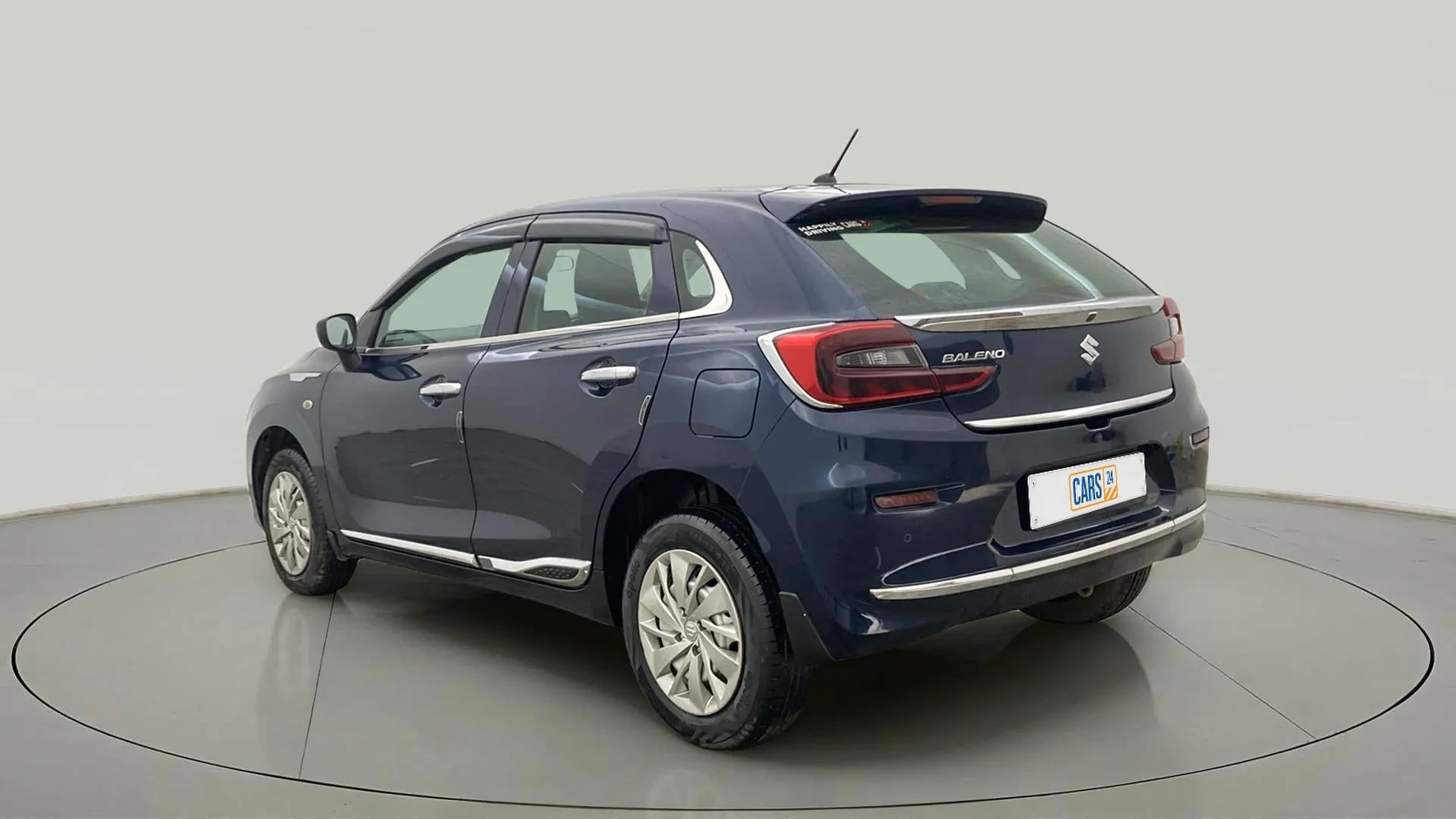 Rear three-quarter view of a Nexa Blue Maruti Suzuki Baleno