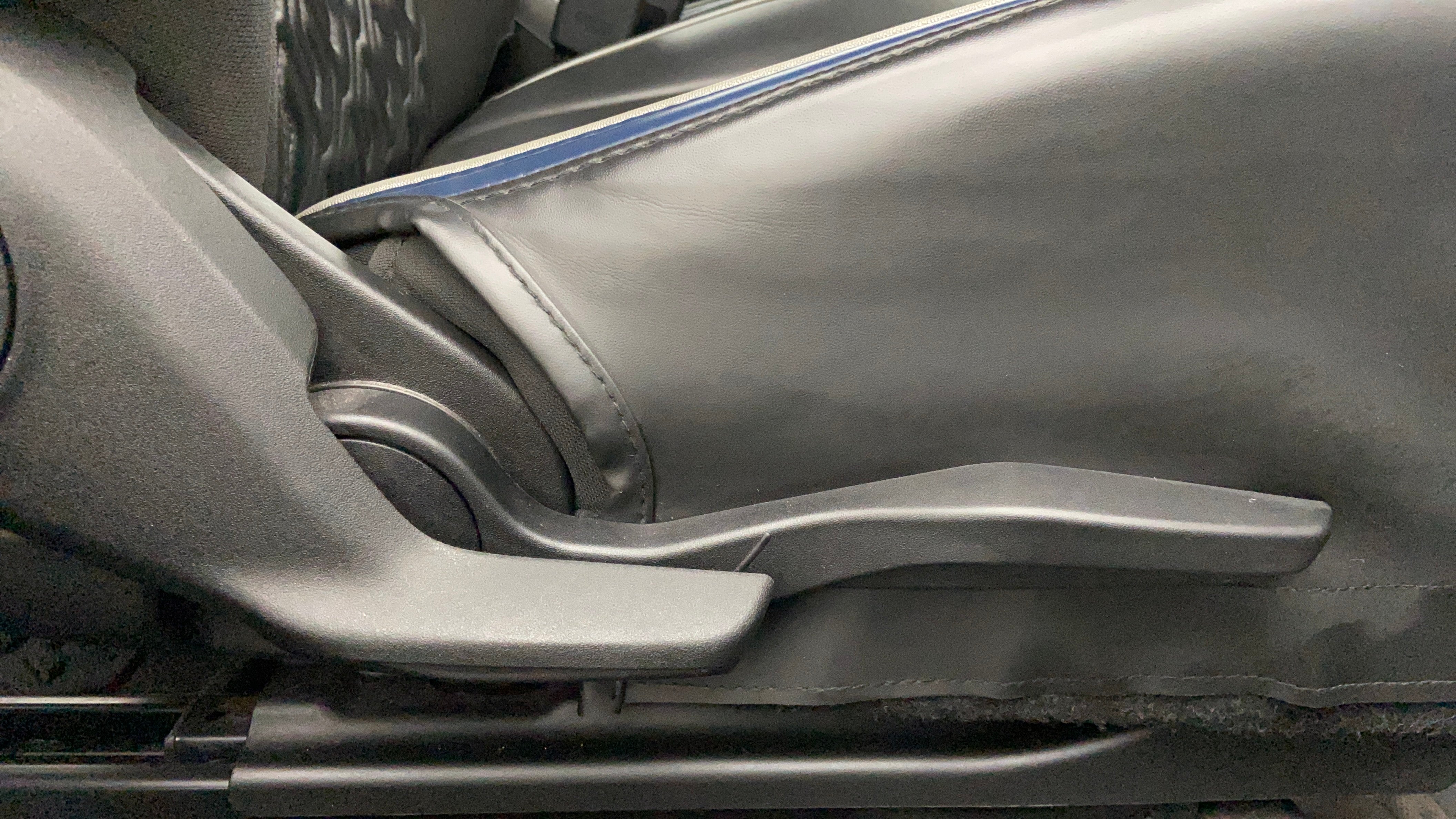 Seat height adjustment lever of a Maruti Suzuki Baleno