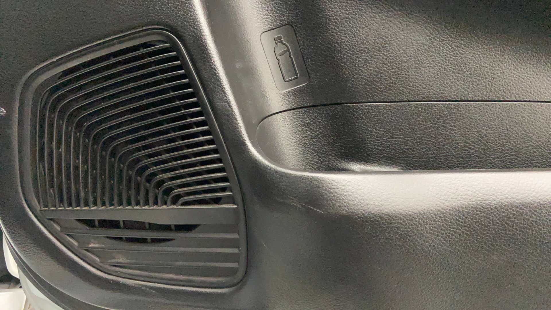 Door panel bottle holder area of a Maruti Suzuki Baleno