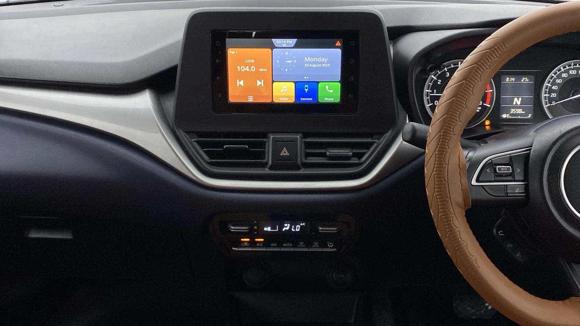 Dashboard and infotainment display of a Maruti Suzuki Baleno