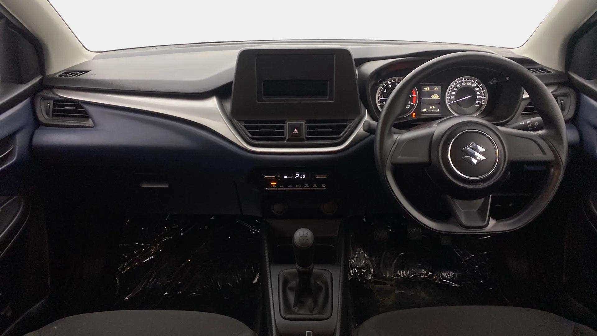 Dashboard and steering wheel view of a Maruti Suzuki Baleno