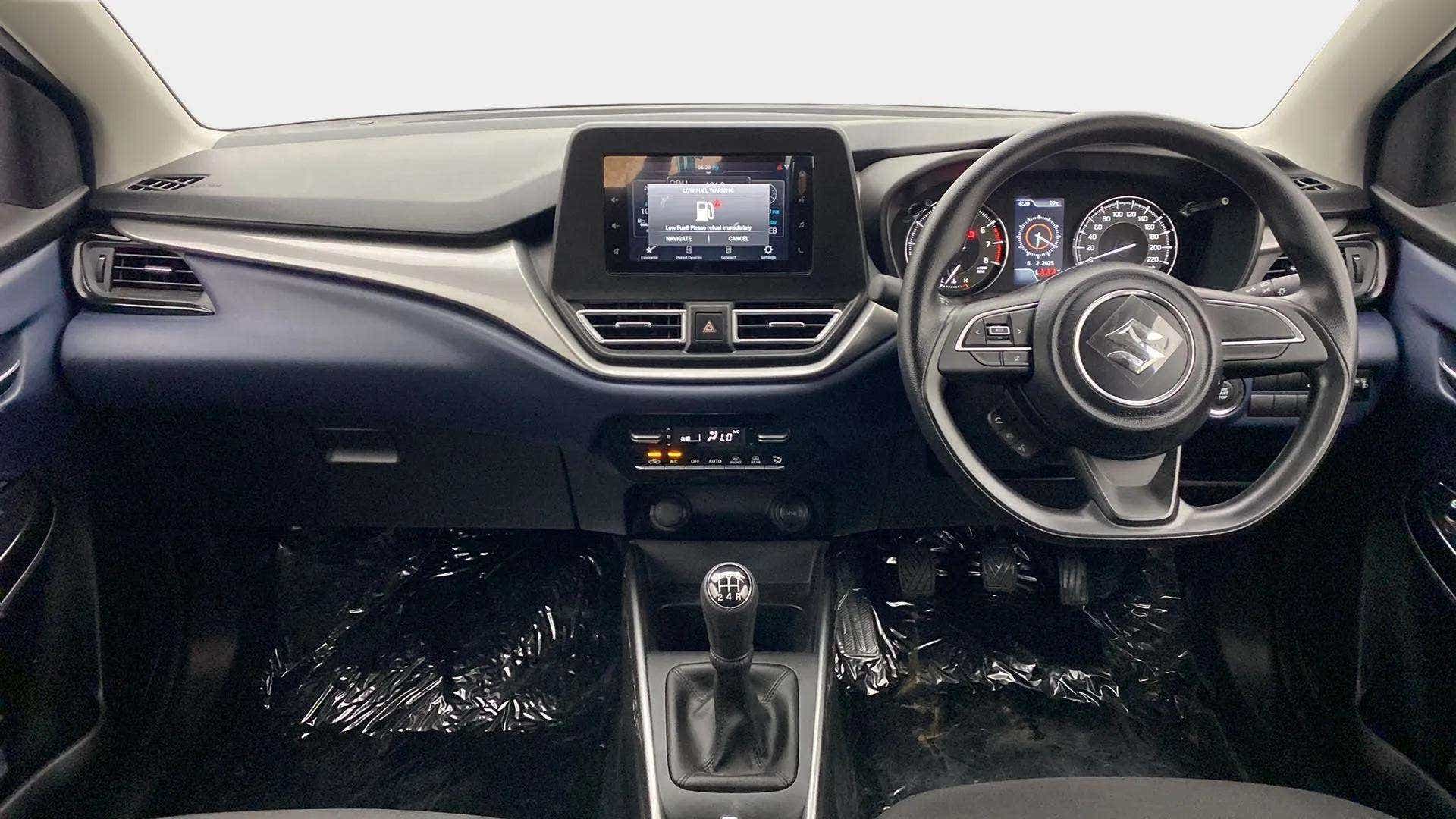 Interior dashboard view of a Maruti Suzuki Baleno