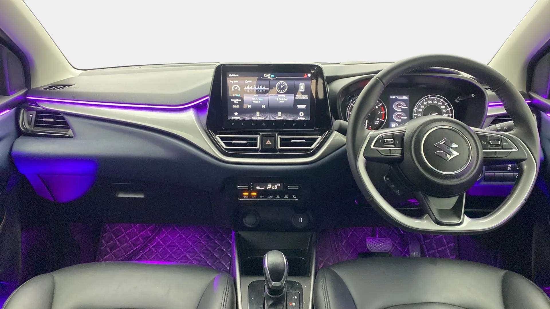 Dashboard and steering wheel of a Maruti Suzuki Baleno