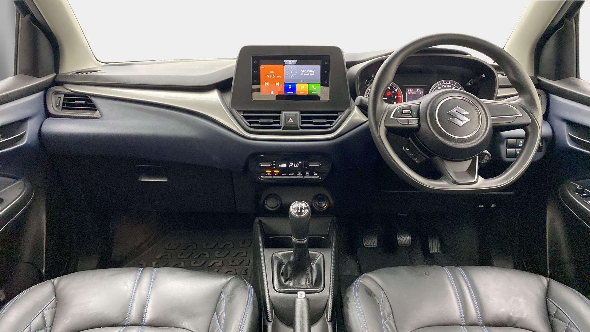 Dashboard and steering wheel of a Maruti Suzuki Baleno