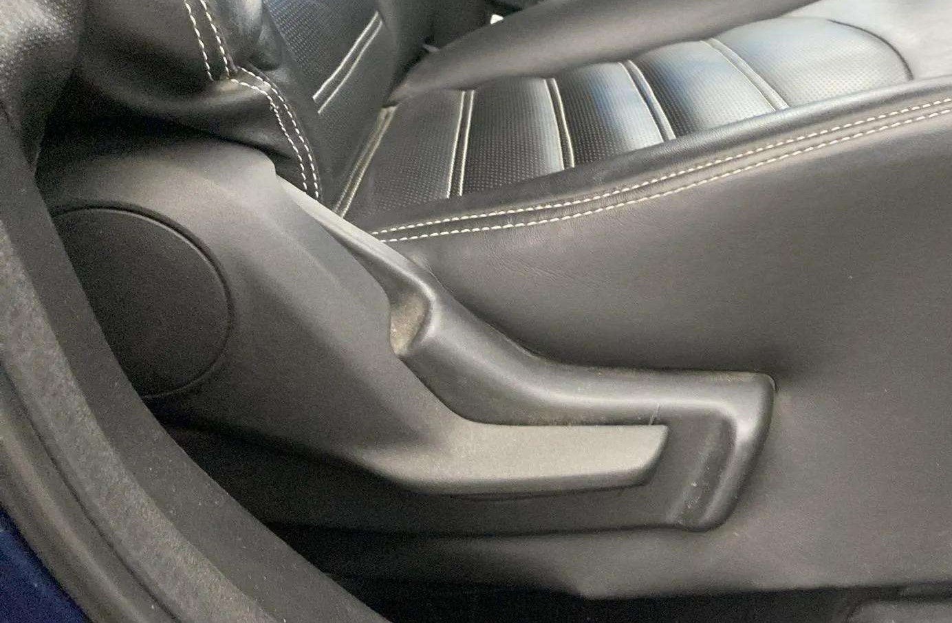 Close-up of a seat adjuster and stitching on a Maruti Suzuki Baleno