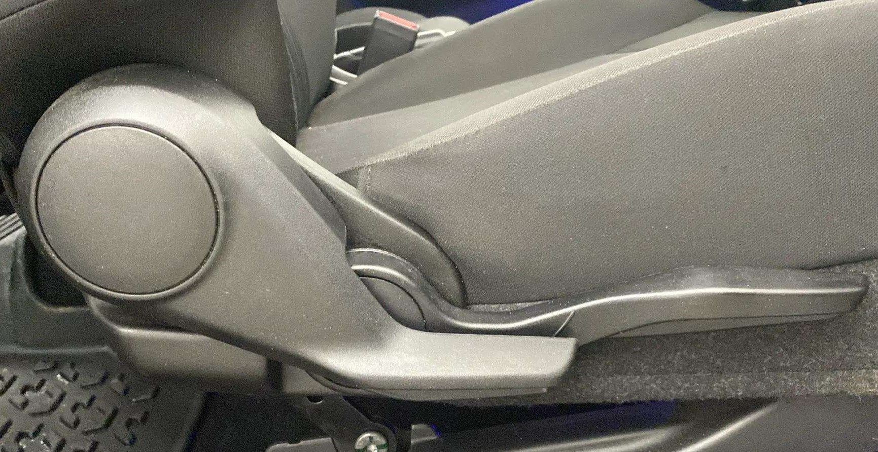 Seat adjuster lever of a Maruti Suzuki Baleno