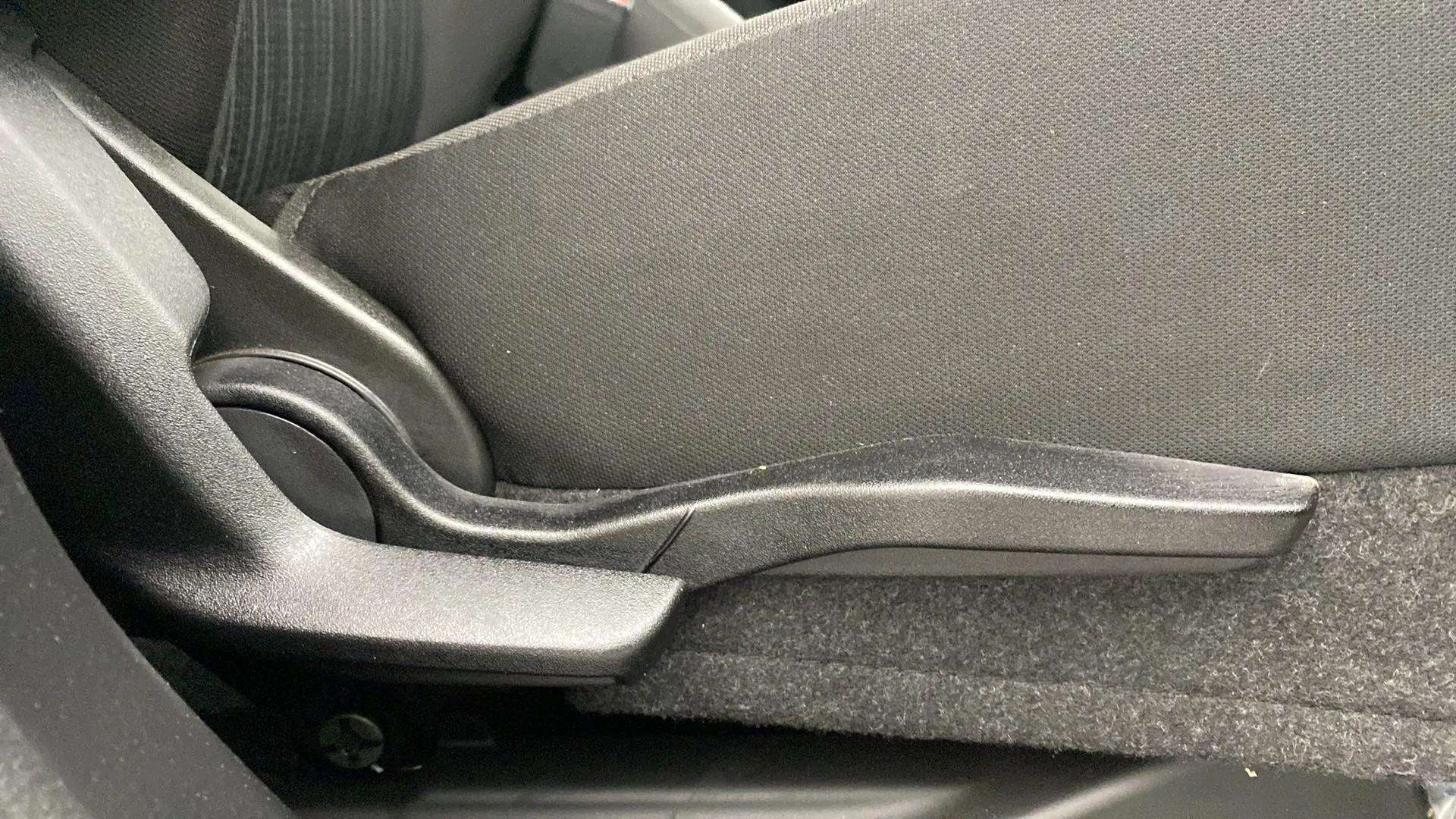 Seat adjuster handle of a Maruti Suzuki Baleno