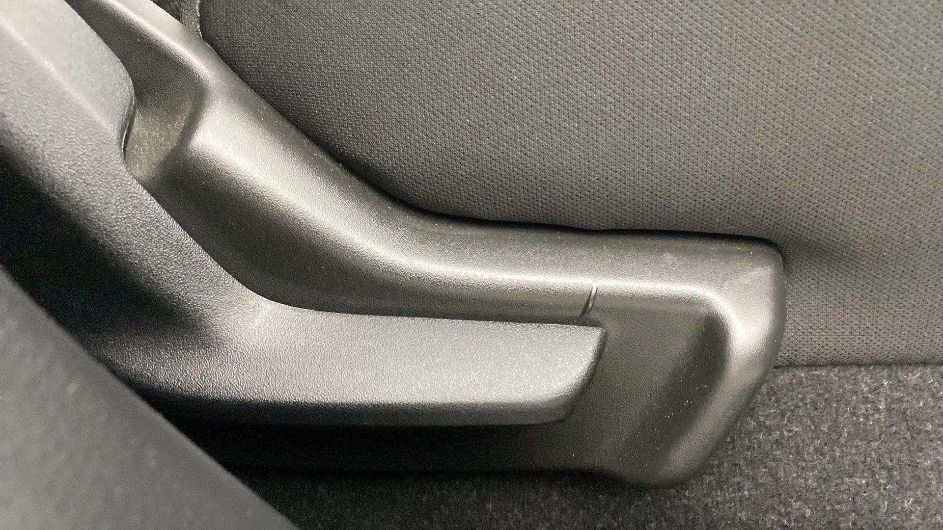 Seat adjuster lever of a Maruti Suzuki Baleno