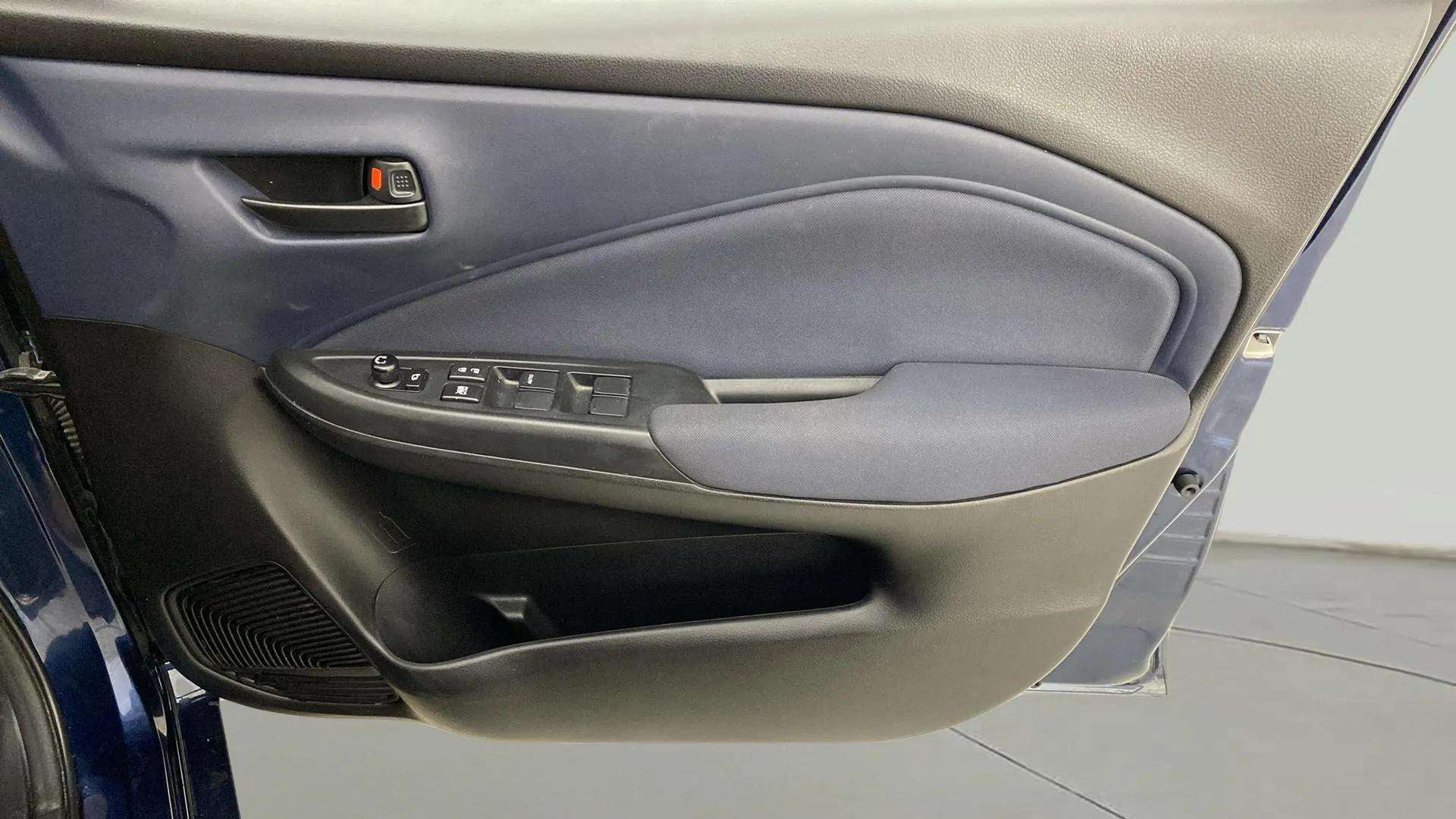 Driver side door panel of a Maruti Suzuki Baleno