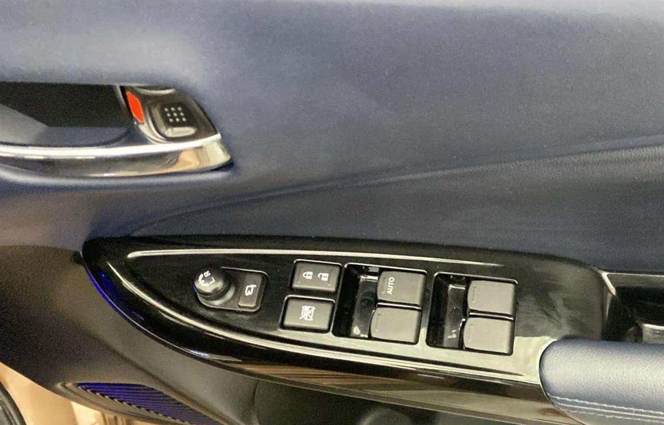 Driver-side window controls of a Maruti Suzuki Baleno