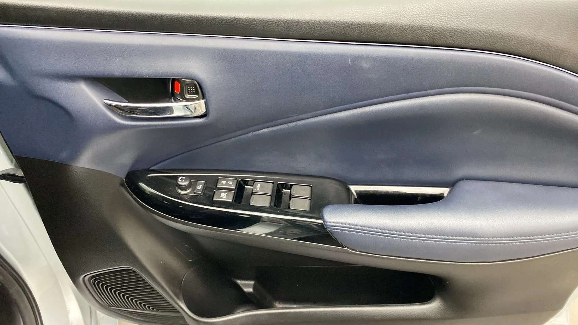 Driver side door panel of a Maruti Suzuki Baleno