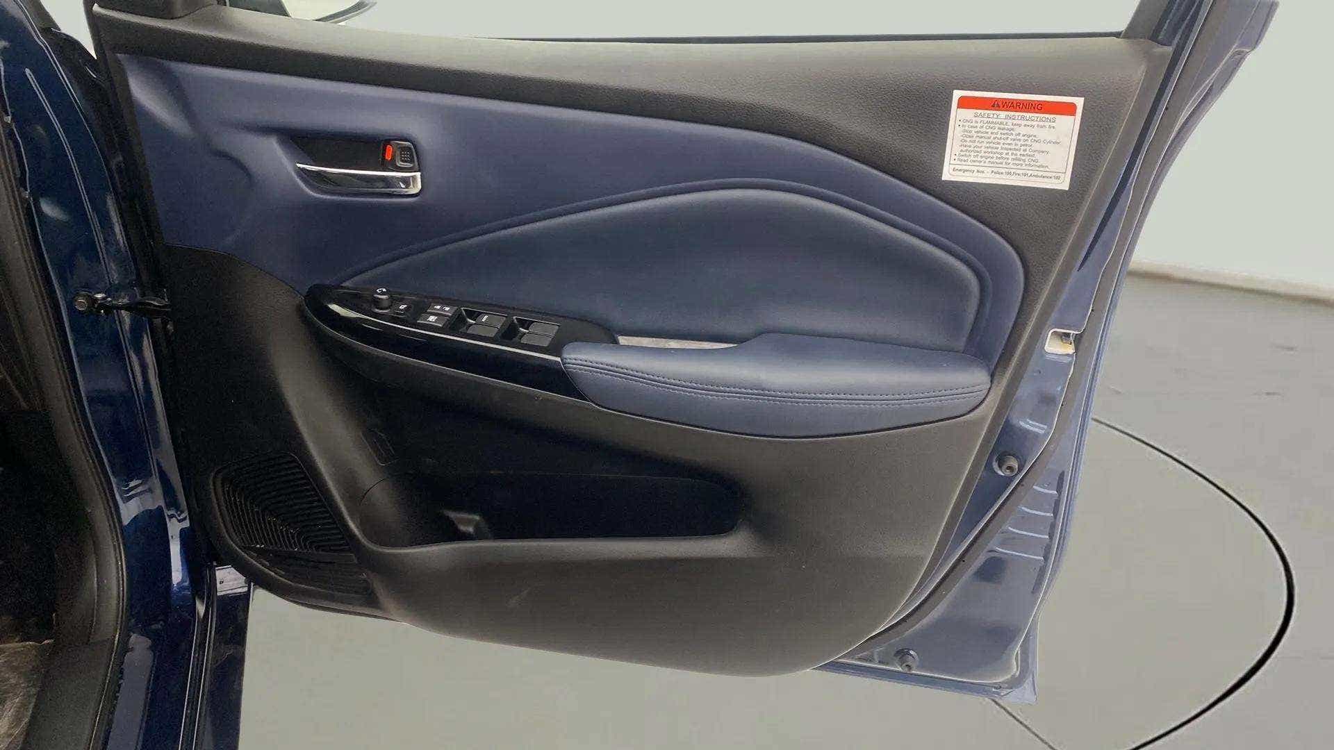 Driver side door panel of a Maruti Suzuki Baleno