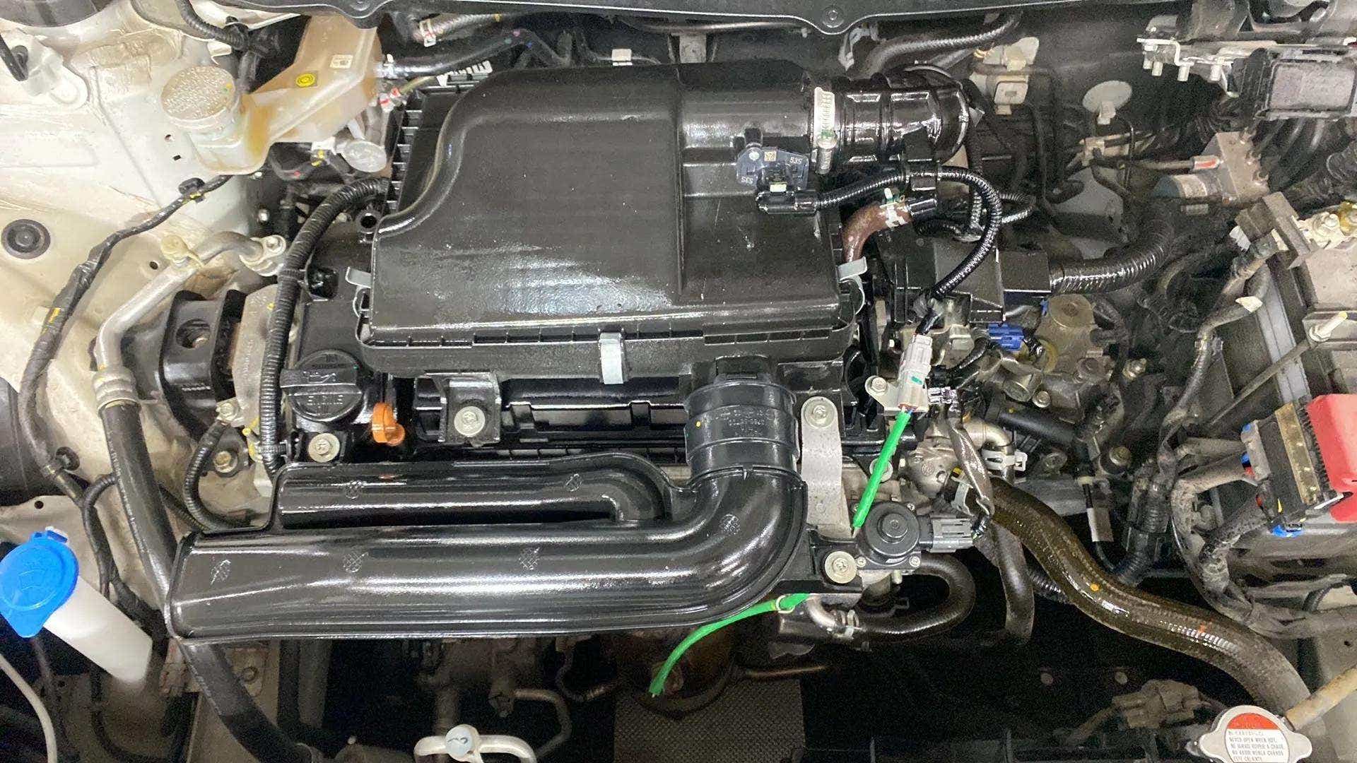 Engine bay view of a Maruti Suzuki Baleno