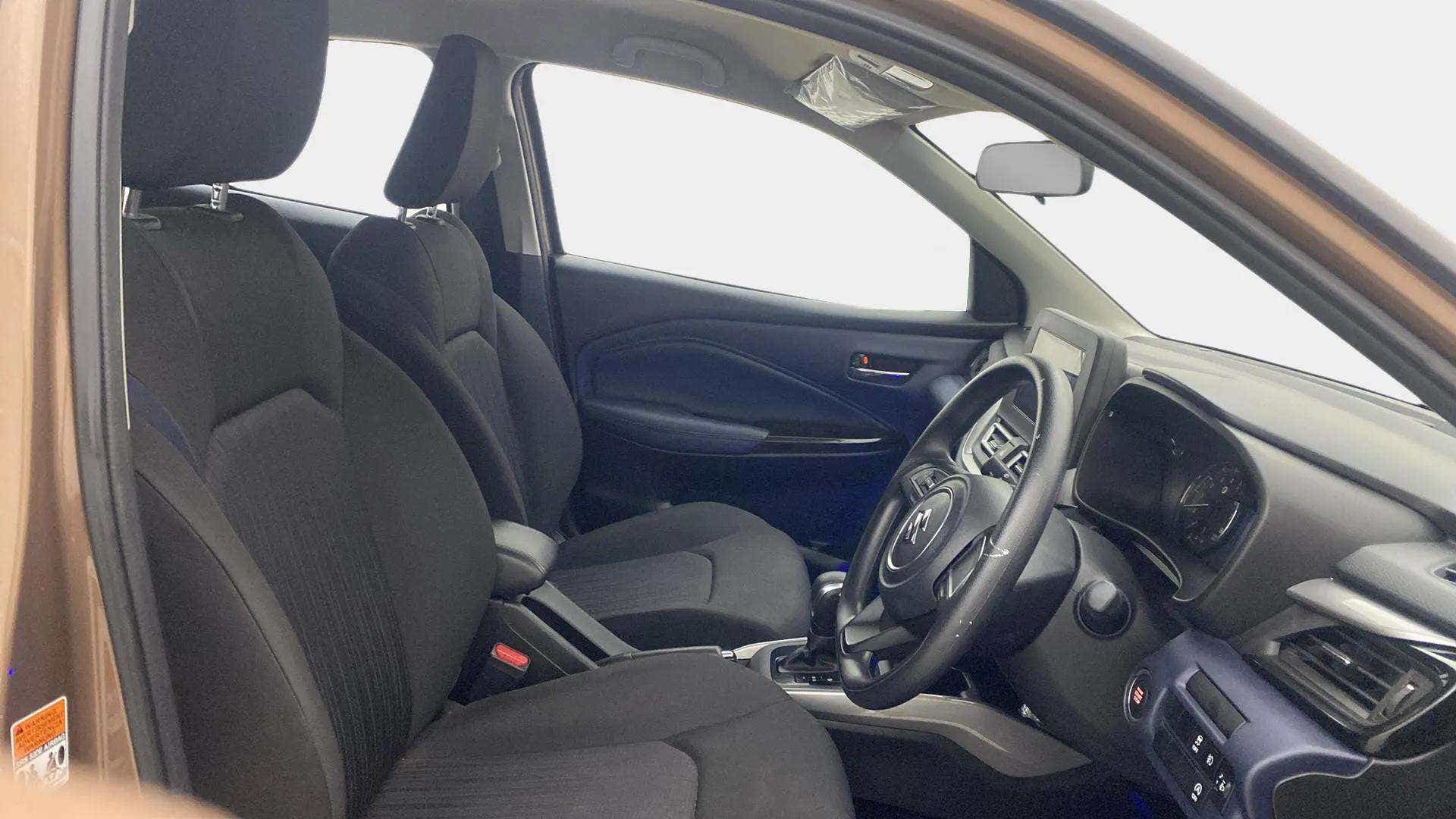 Front seat and dashboard view of a Maruti Suzuki Baleno