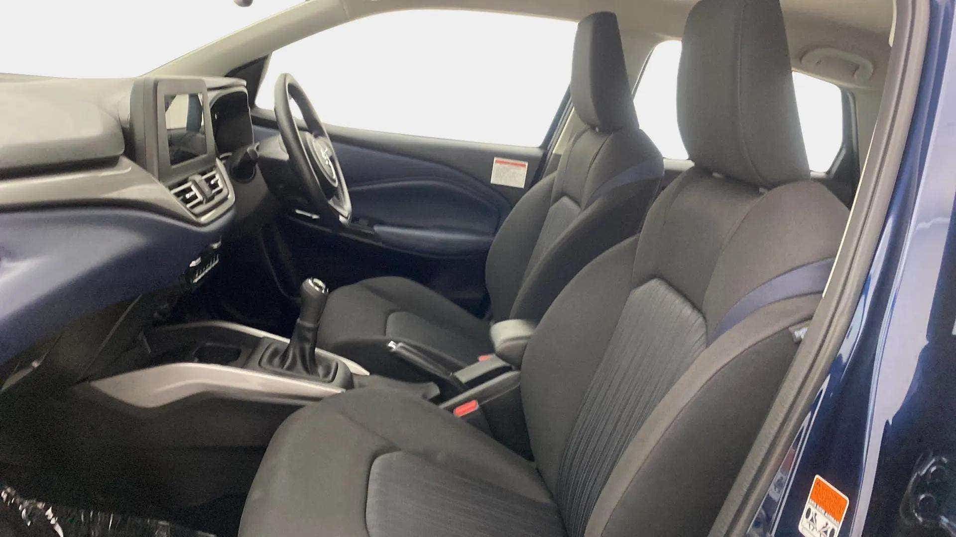 Interior front seats and dashboard of a Maruti Suzuki Baleno