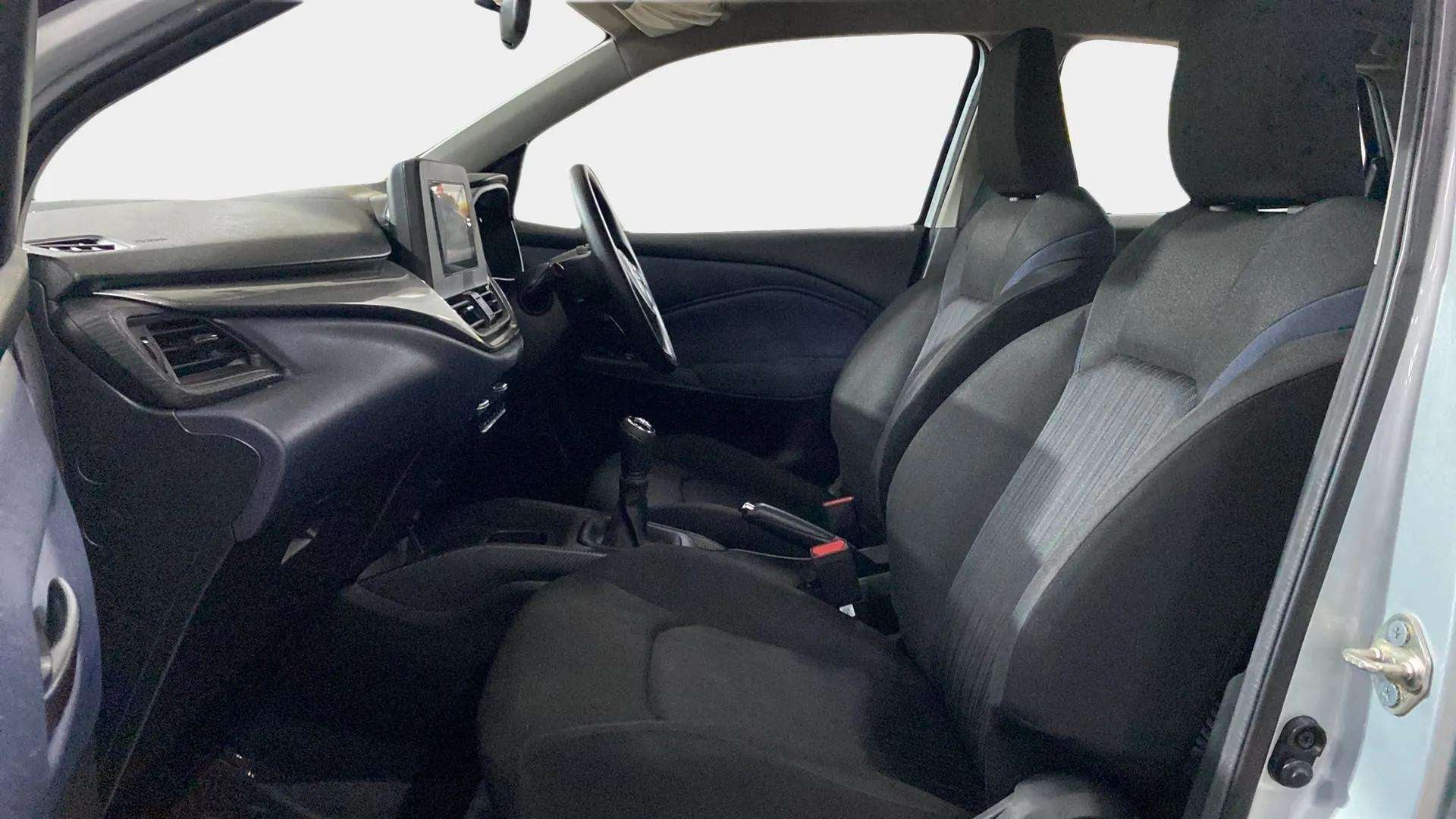 Dashboard and front seats view of a Maruti Suzuki Baleno
