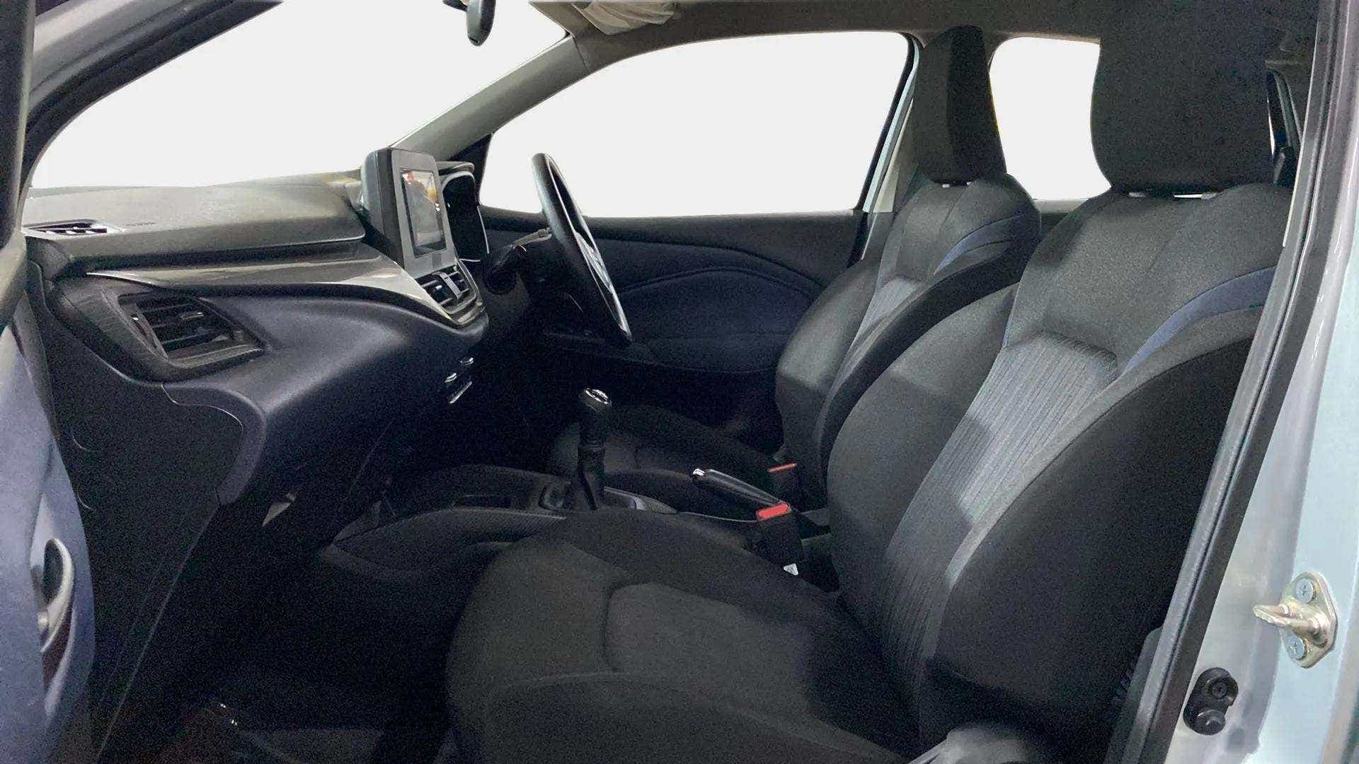Dashboard and front seats view of a Maruti Suzuki Baleno