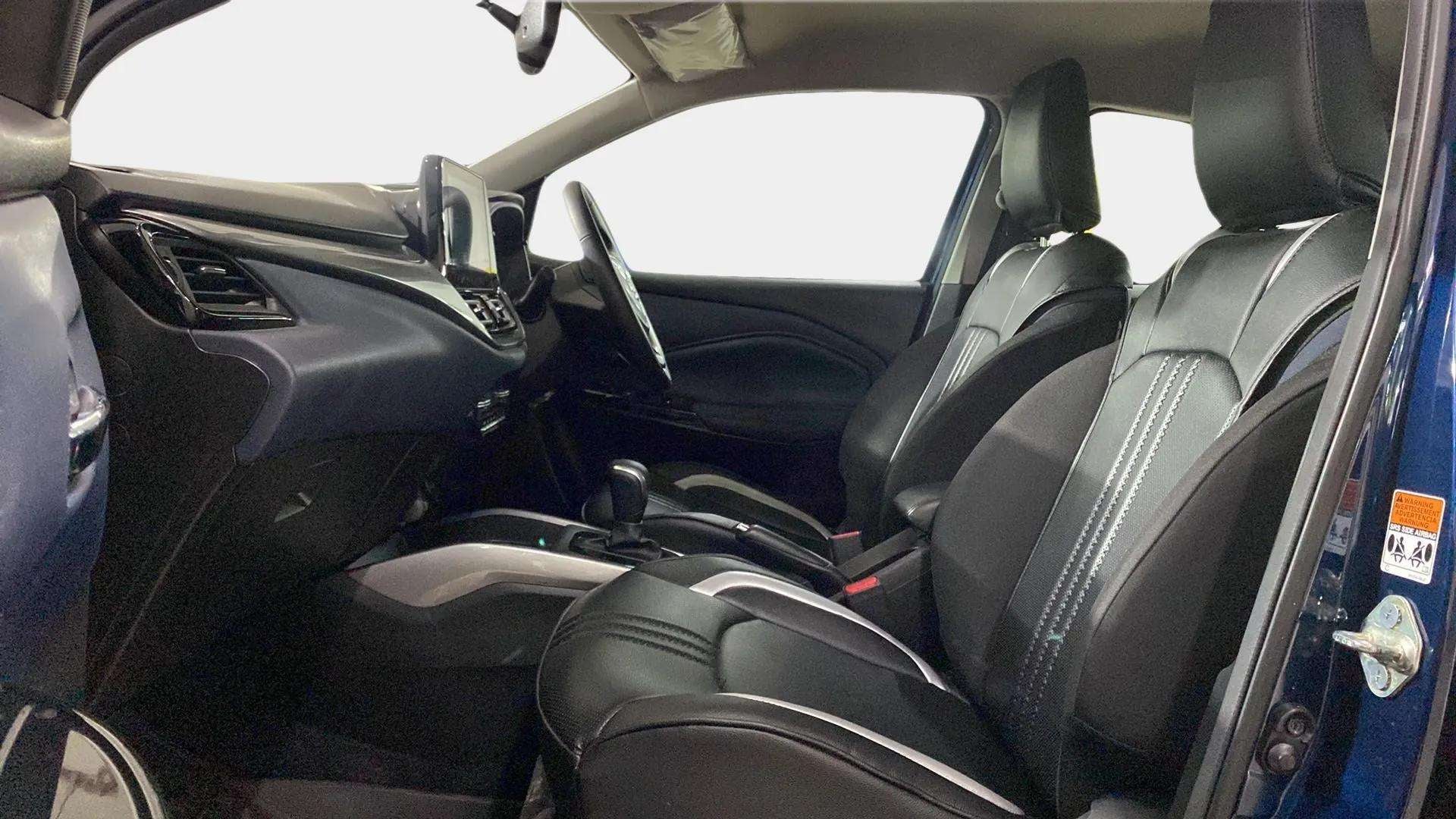 Interior front seats and dashboard of a Maruti Suzuki Baleno