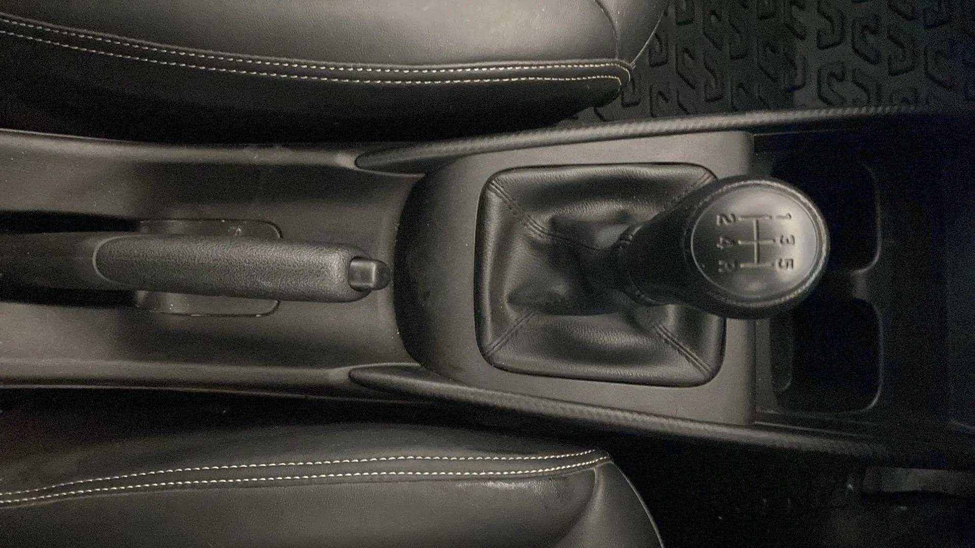 Gear shift and handbrake of a Maruti Suzuki Baleno