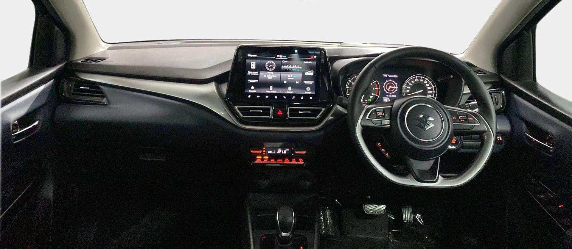 Dashboard and steering wheel of a Maruti Suzuki Baleno