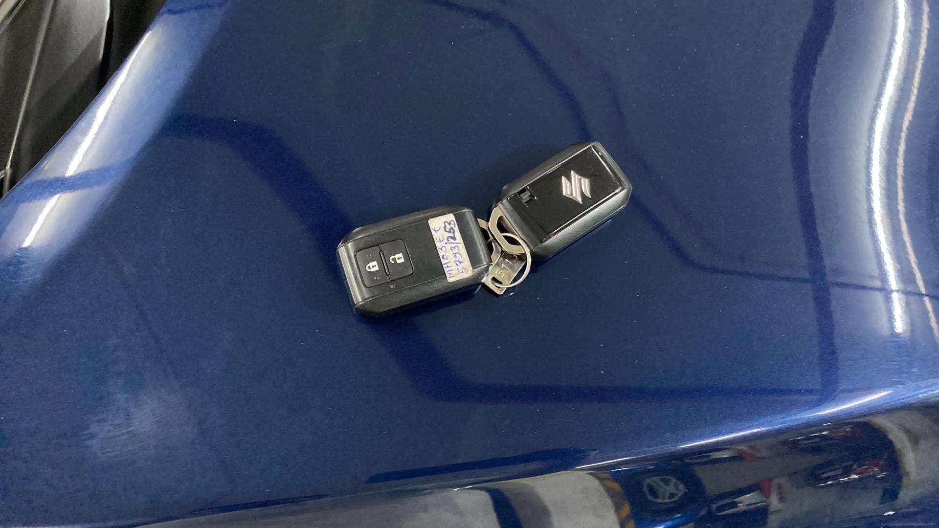 Car key fob on a nexa blue maruti suzuki baleno