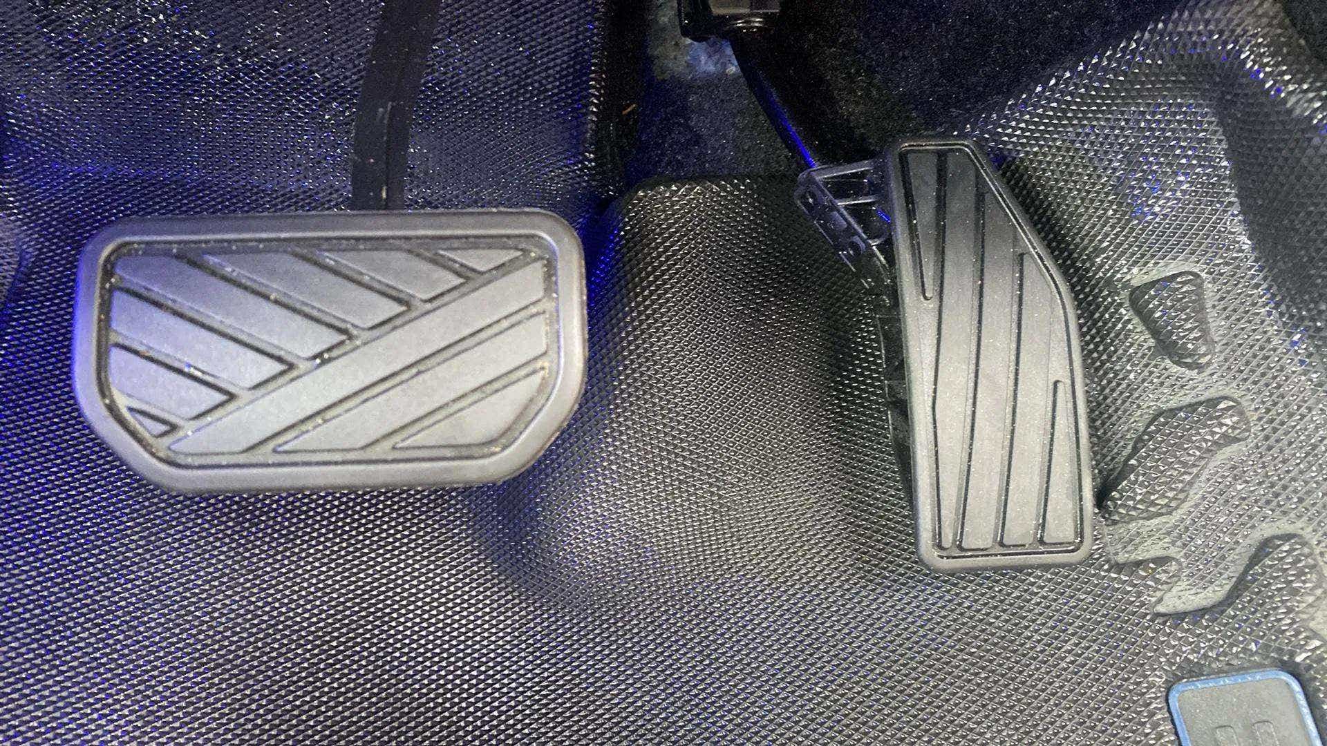 Close-up of accelerator and brake pedals of a Maruti Suzuki Baleno