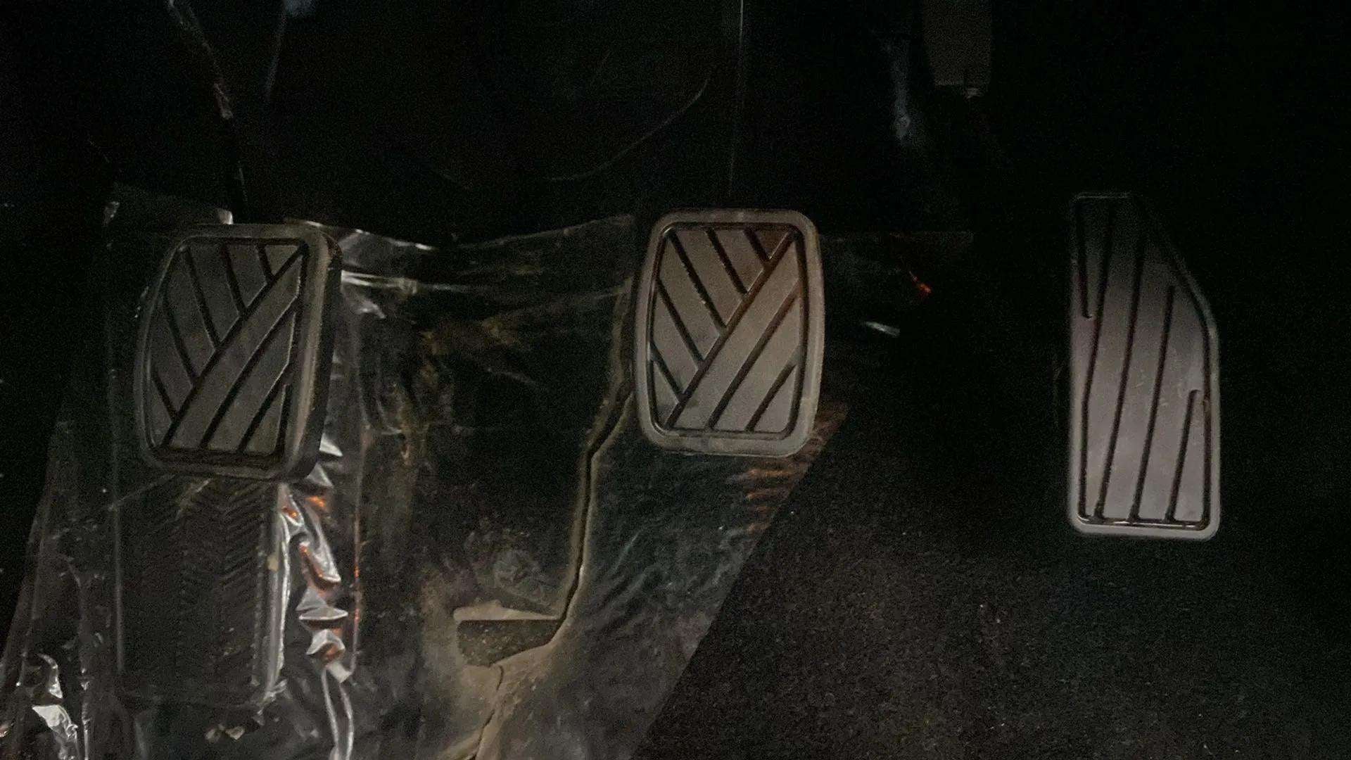 Footwell view of a Maruti Suzuki Baleno showing all three pedals