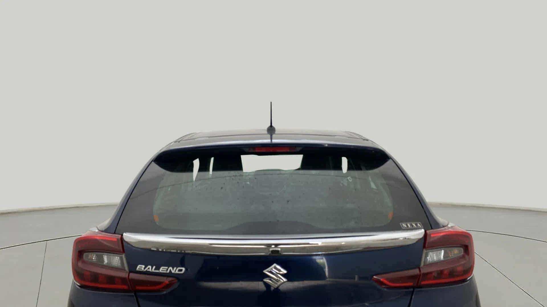 Rear view of a Nexa Blue Maruti Suzuki Baleno