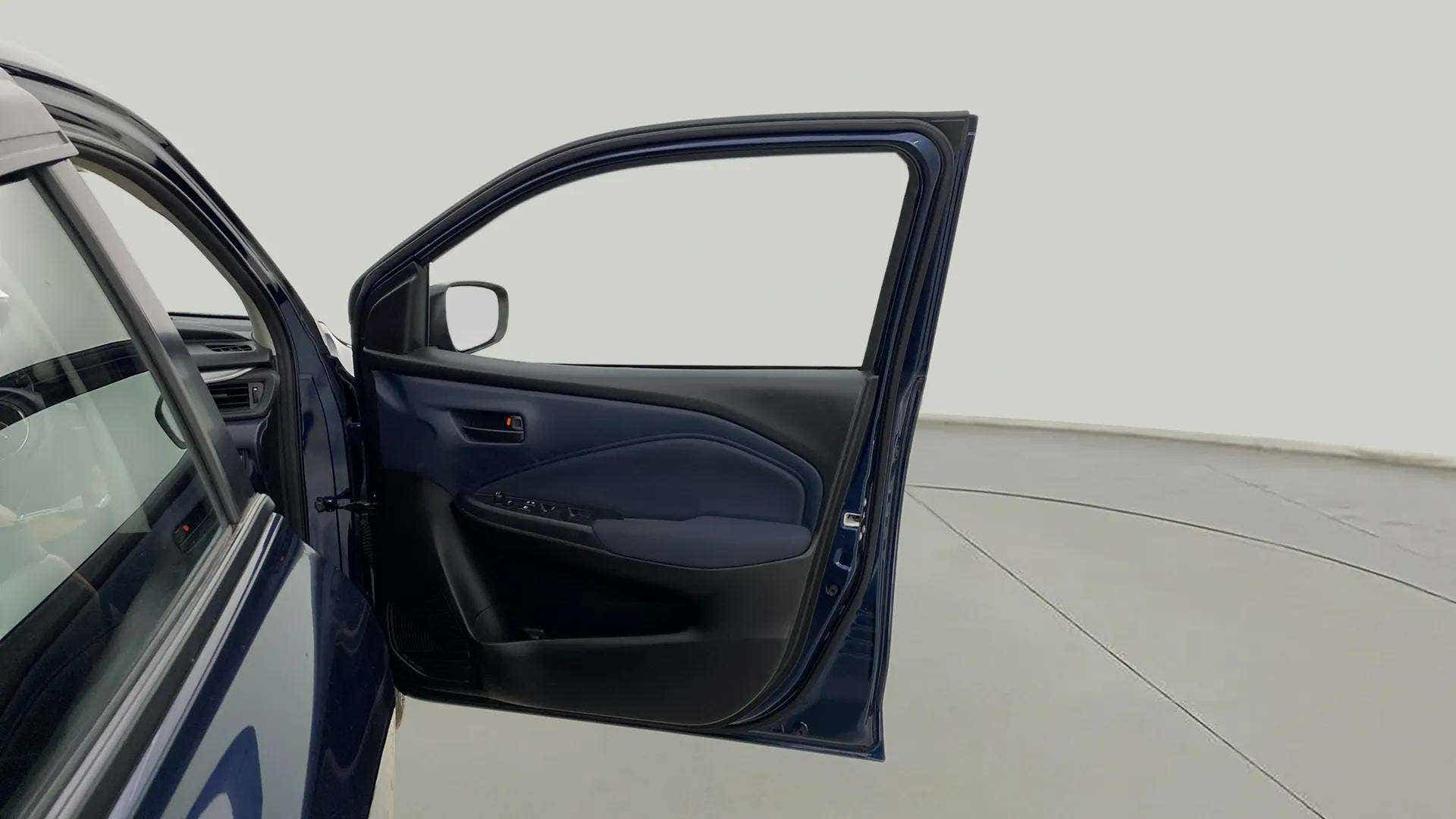 Front driver door interior of a Maruti Suzuki Baleno