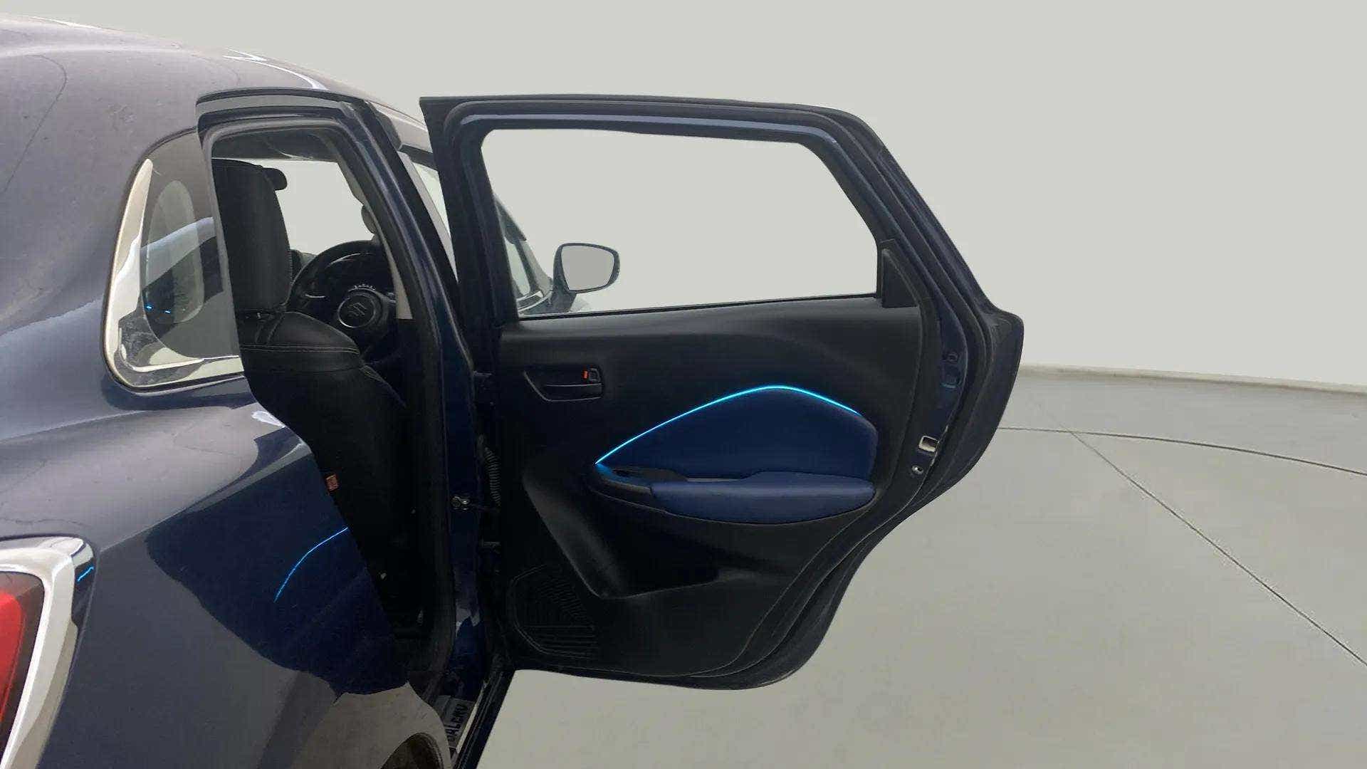 Rear door interior view of a Maruti Suzuki Baleno
