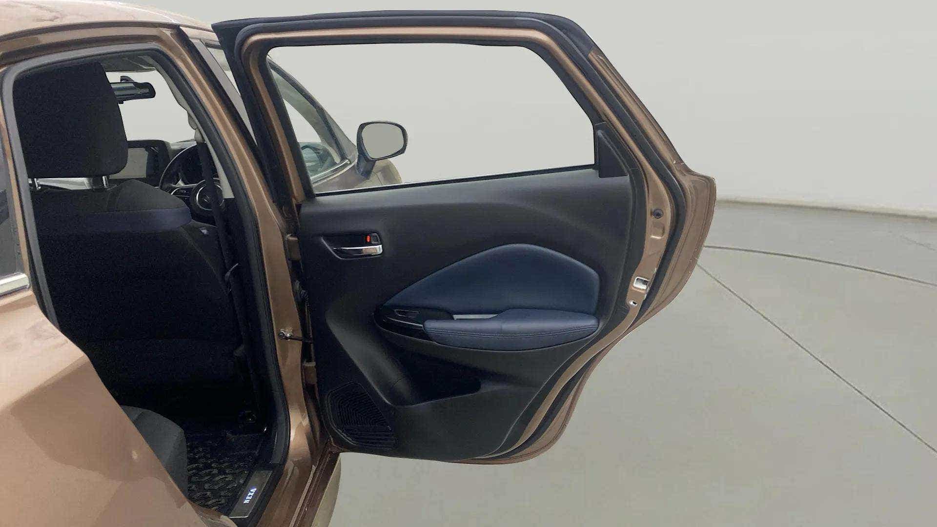Rear left door interior of a Maruti Suzuki Baleno