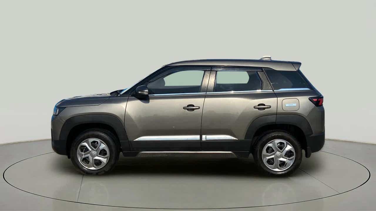 Side view of a Magma Grey Maruti Suzuki Brezza