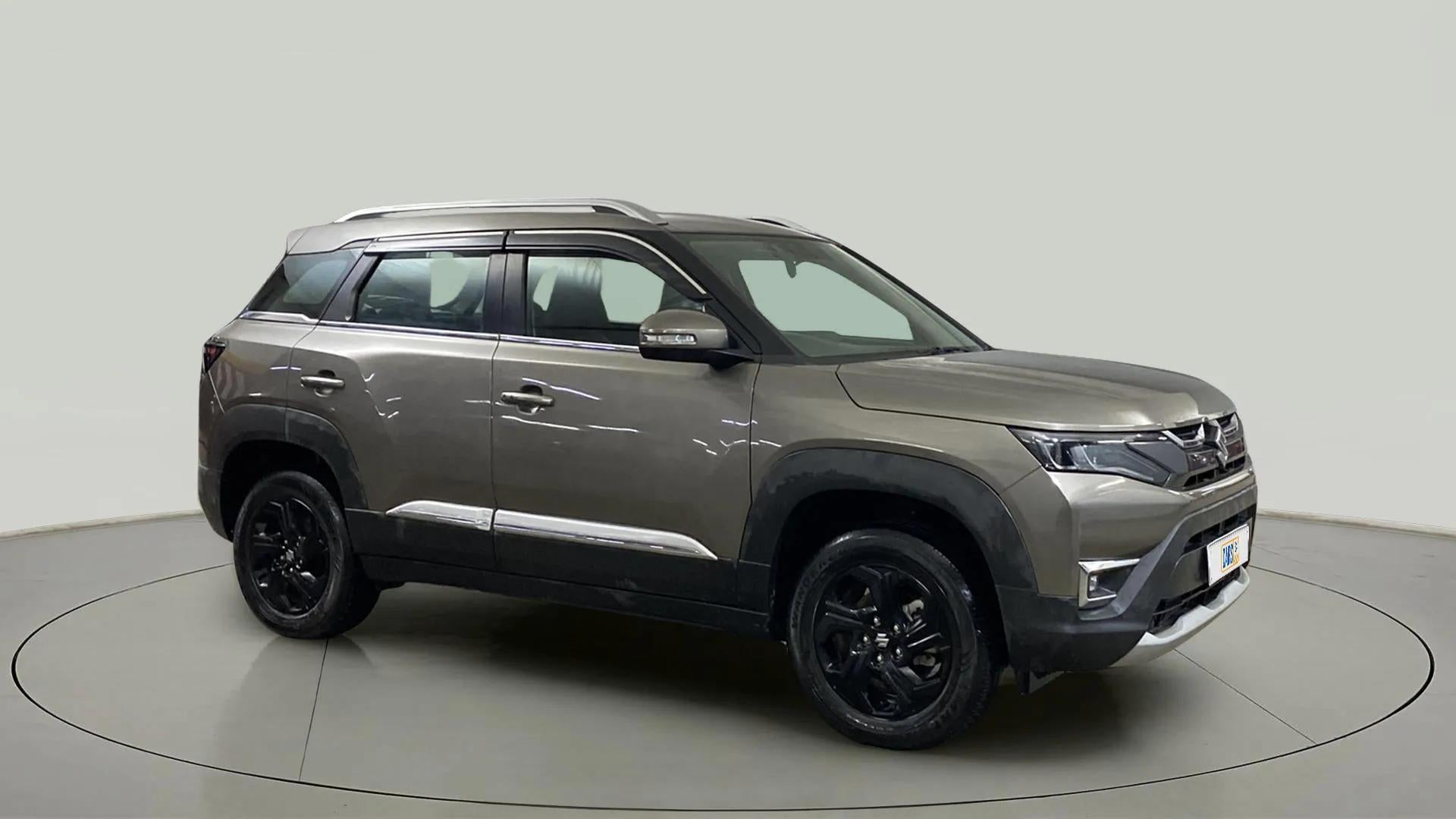 Side view of a Magma Grey Maruti Suzuki Brezza