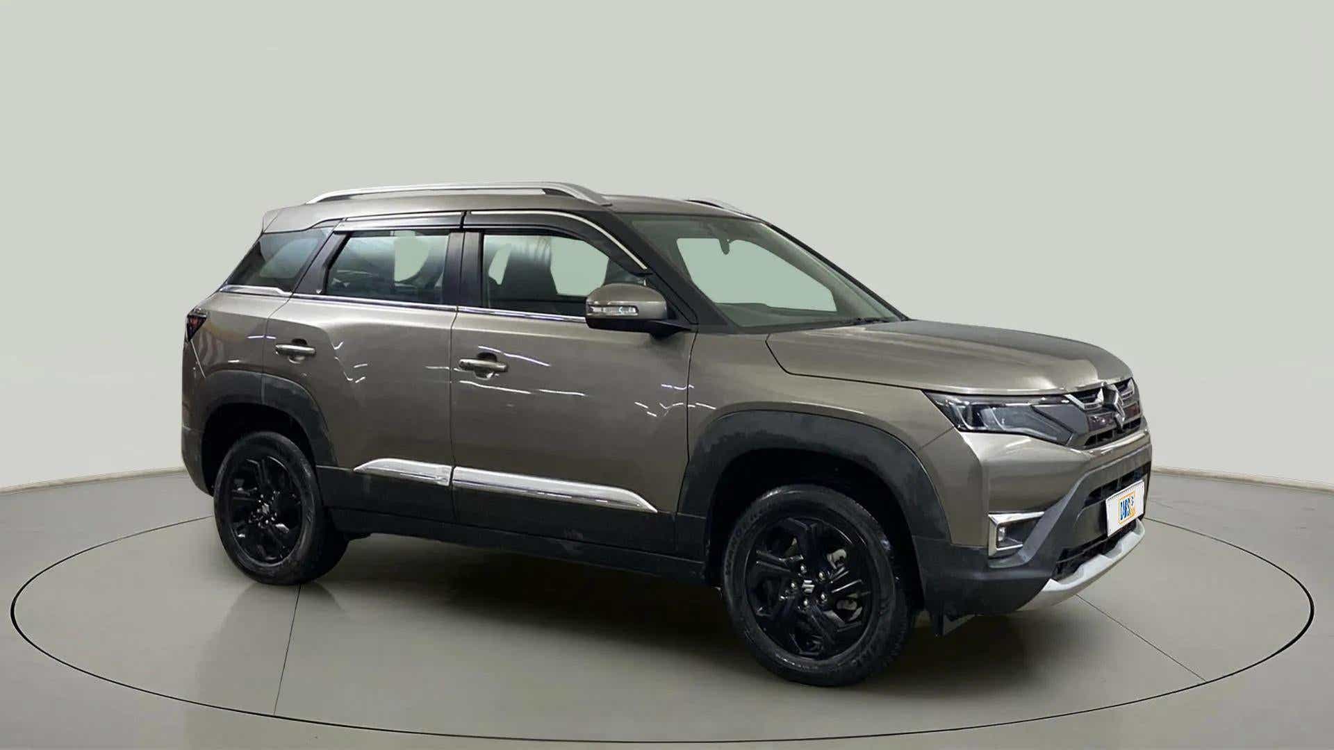 Side view of a Magma Grey Maruti Suzuki Brezza