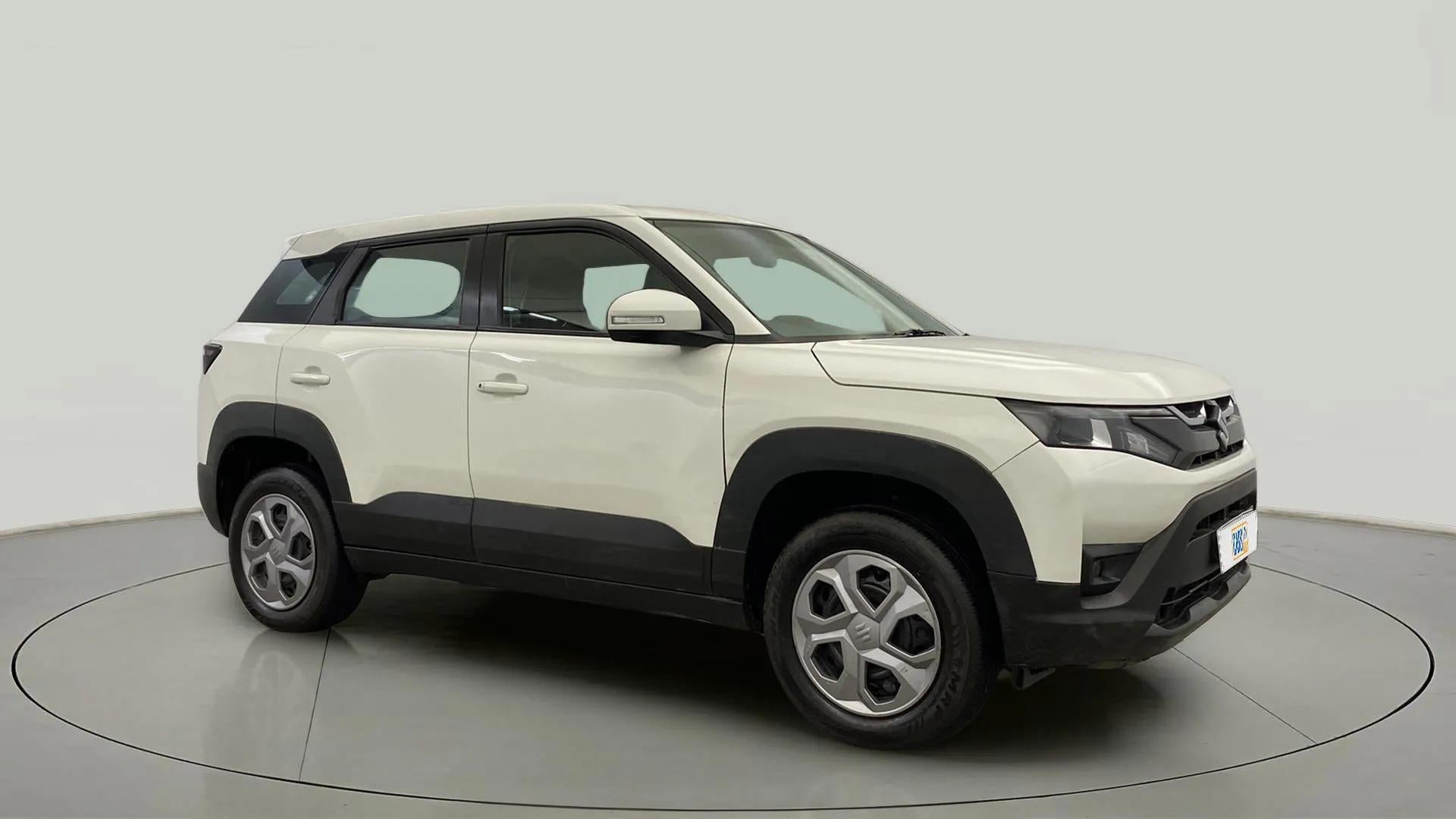 Side view of a Pearl Arctic White Maruti Suzuki Brezza