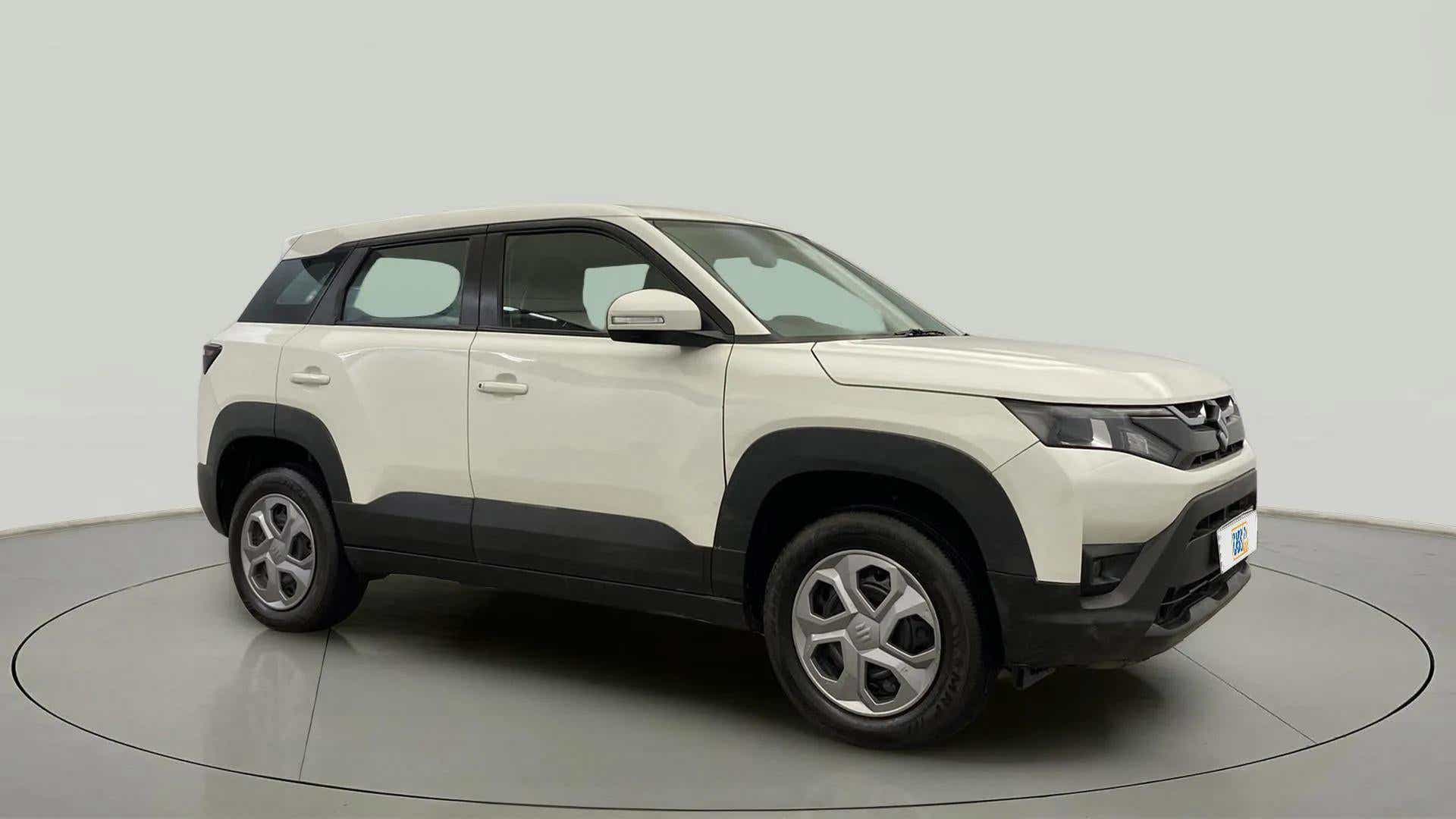 Side view of a Pearl Arctic White Maruti Suzuki Brezza