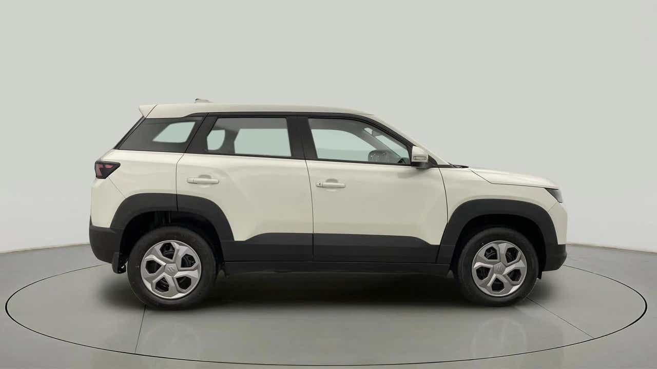 Side view of a Pearl Arctic White Maruti Suzuki Brezza
