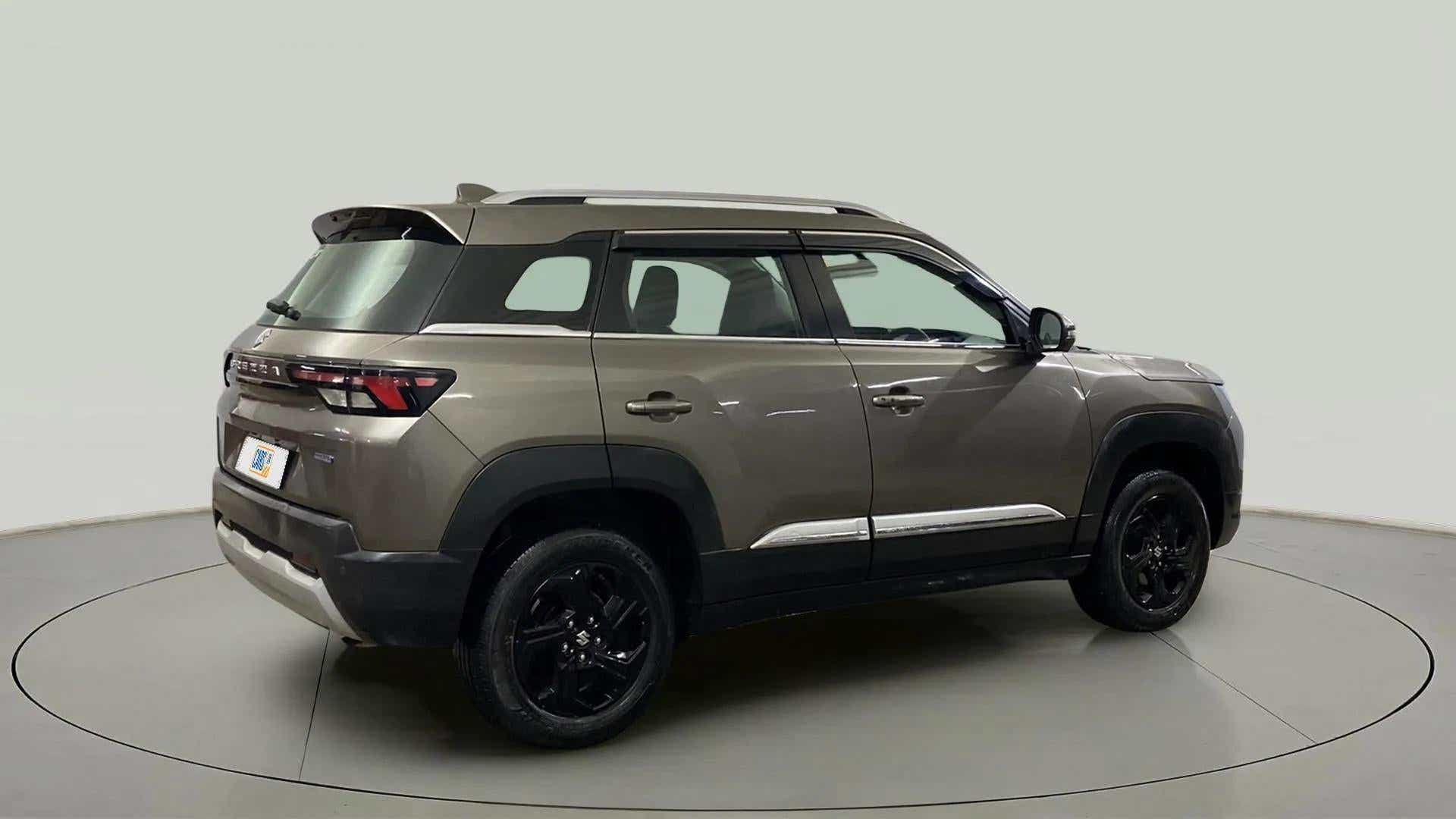 Rear three-quarter view of a Maruti Suzuki Brezza