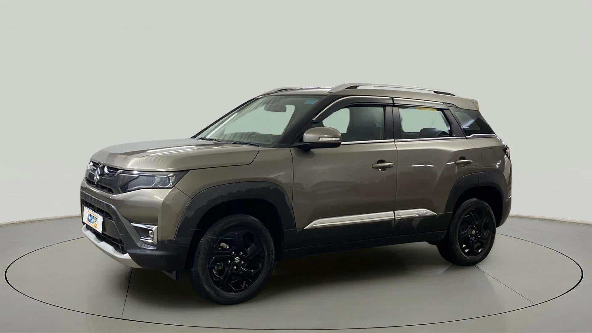 Front three-quarter view of a Magma Grey Maruti Suzuki Brezza