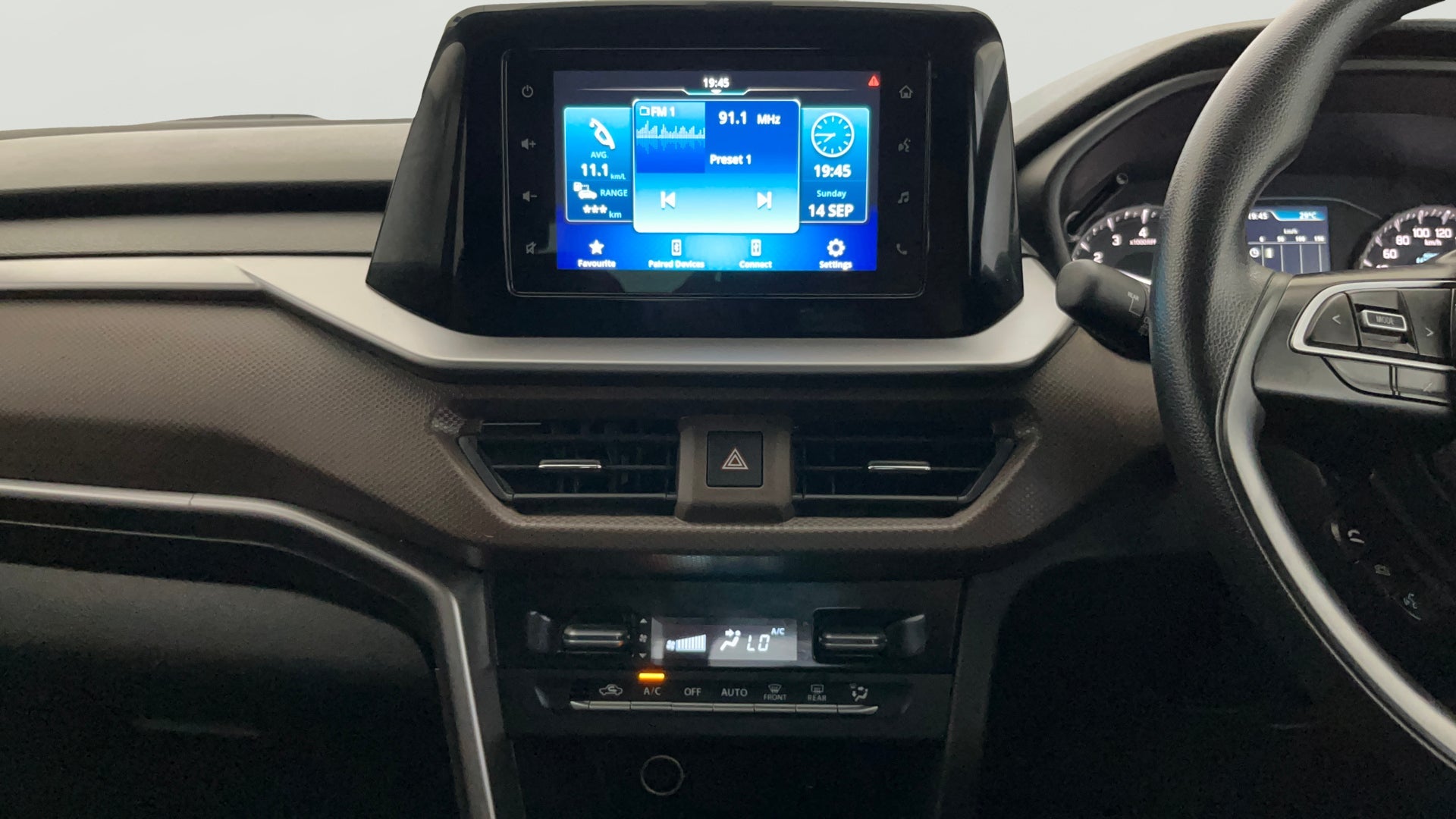 Dashboard and infotainment display of a Maruti Suzuki Brezza