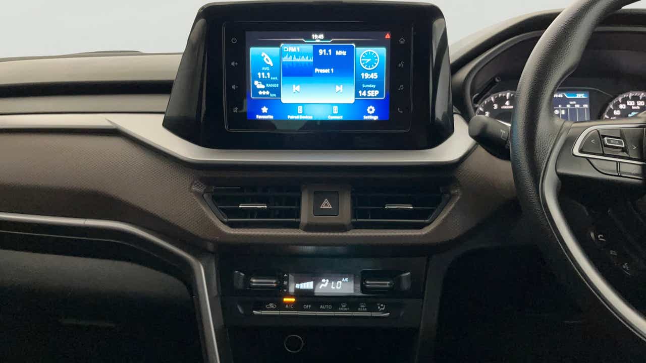 Dashboard and infotainment display of a Maruti Suzuki Brezza