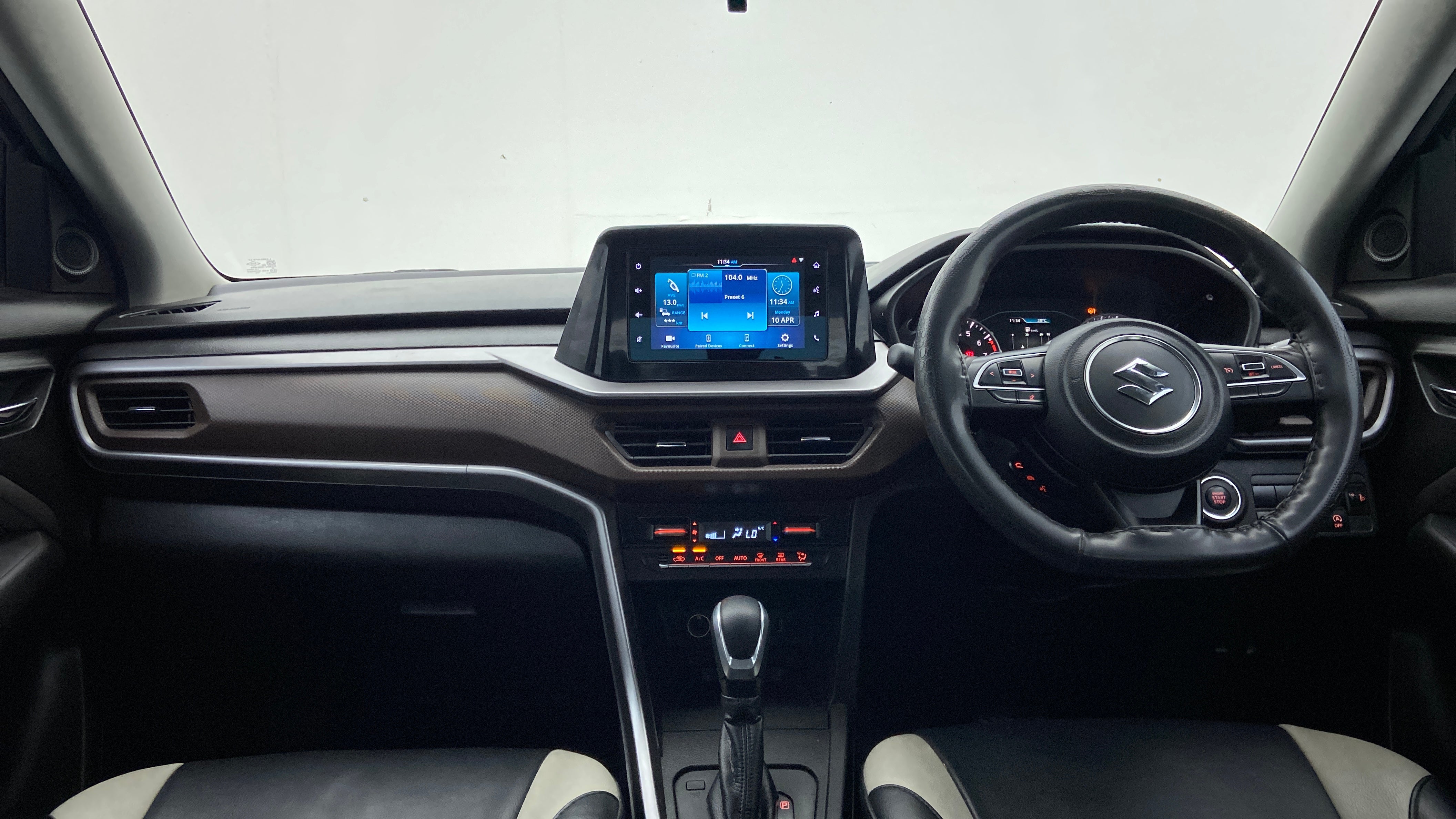 Interior dashboard view of a Maruti Suzuki Brezza