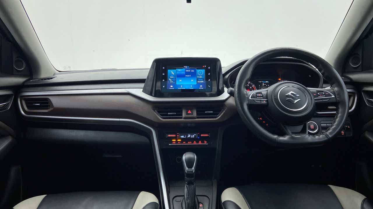 Interior dashboard view of a Maruti Suzuki Brezza